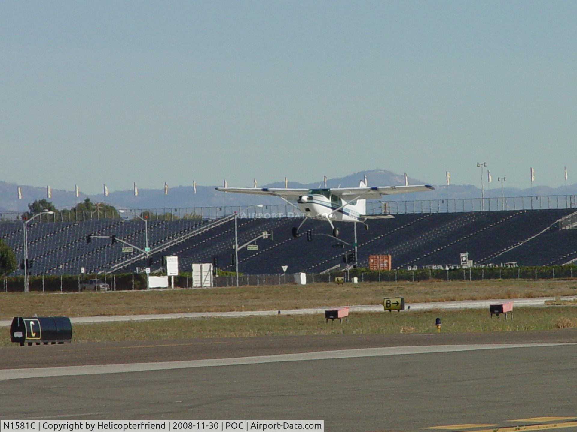 N1581C, 1953 Cessna 180 C/N 30281, Airbourne between taxiway A & B