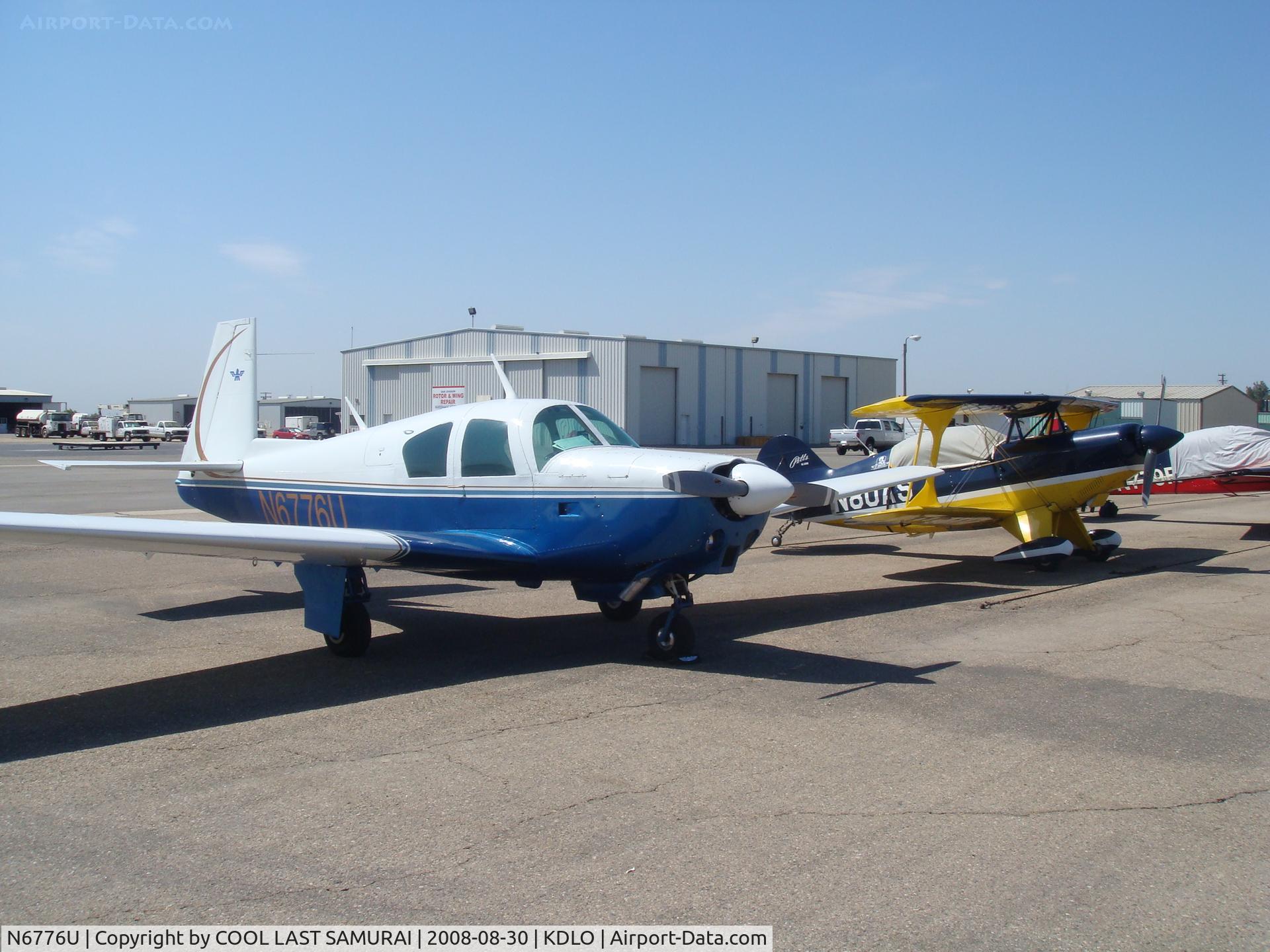 N6776U, 1963 Mooney M20C Ranger C/N 2498, Delano Airport Transient Parking.