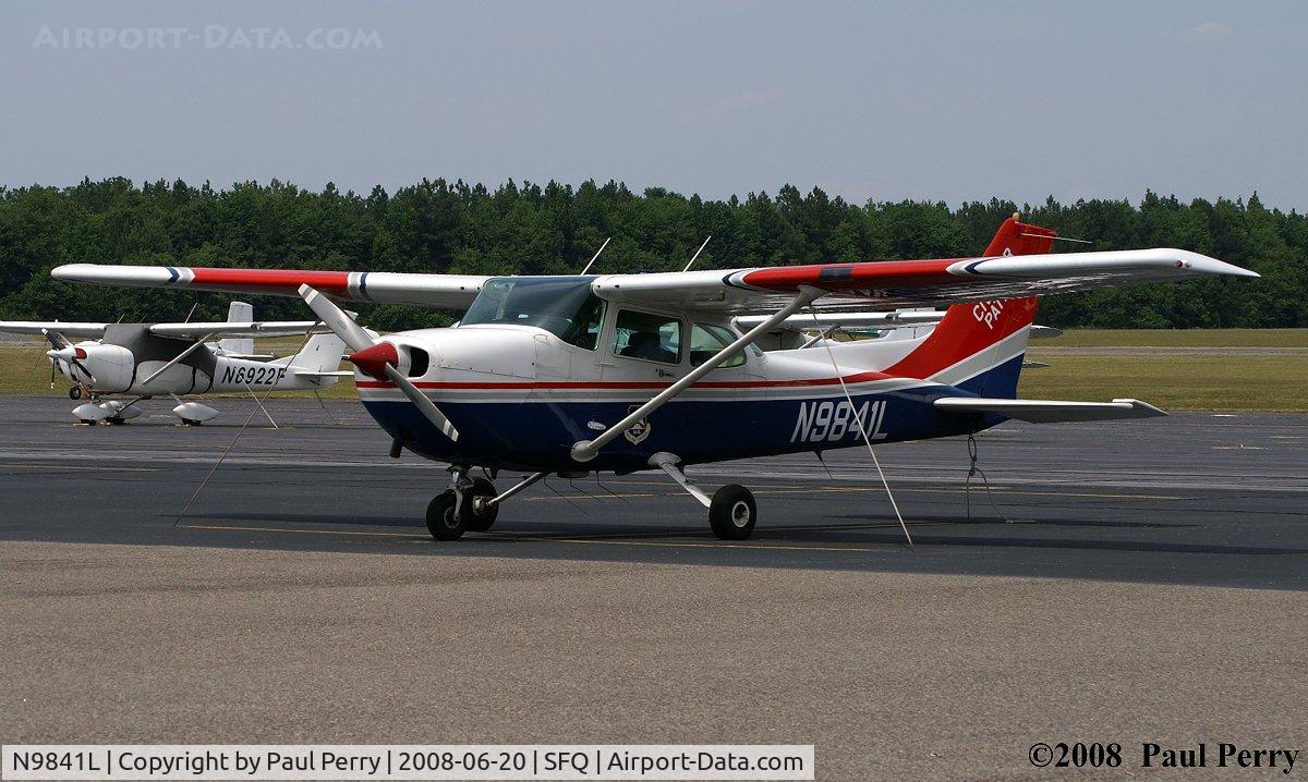 N9841L, 1986 Cessna 172P C/N 17276632, Civil Air Patrol girl on the ramp between flights
