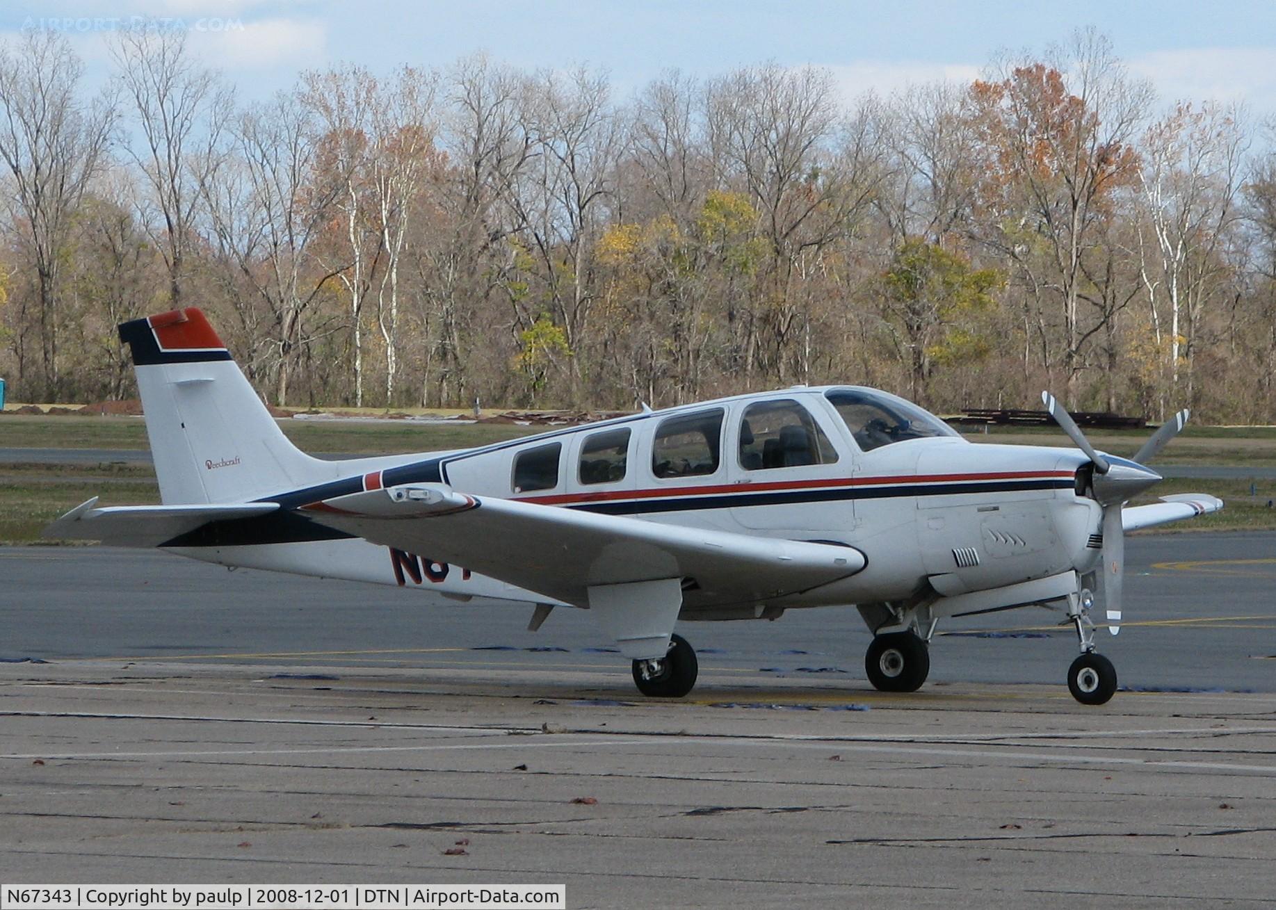 N67343, 1980 Beech A36 Bonanza 36 C/N E-1649, Parked at Downtown Shreveport.