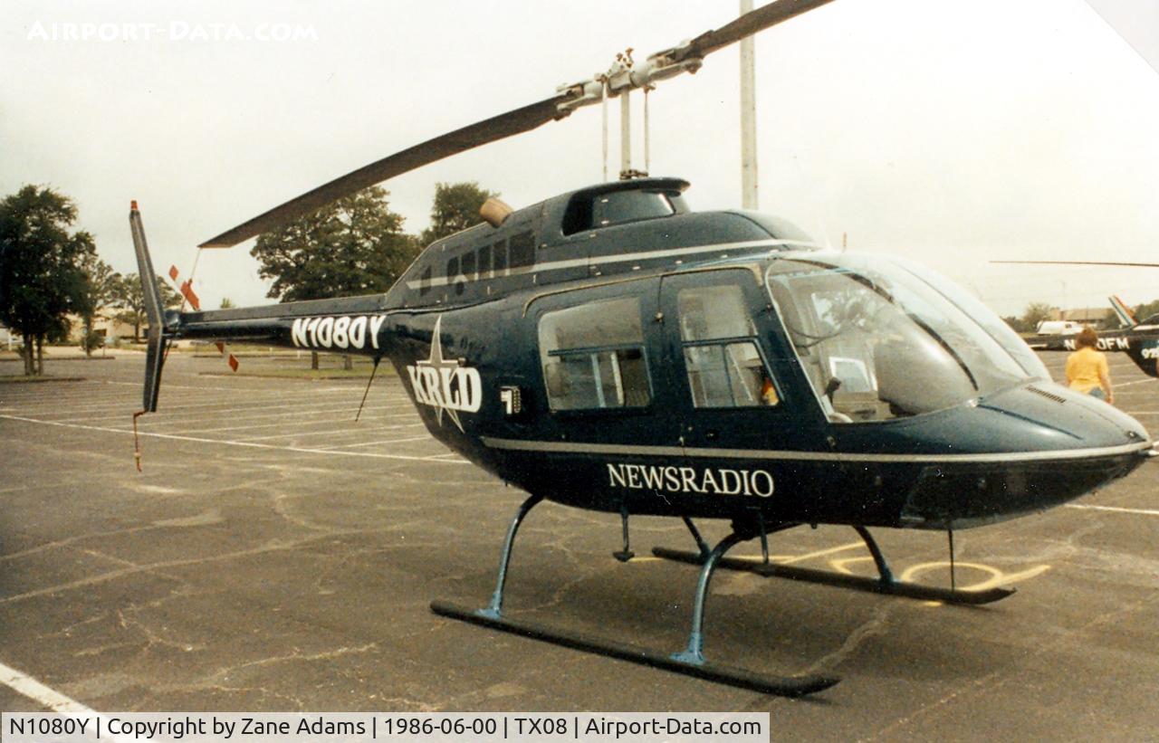N1080Y, Bell 206B JetRanger II C/N 1151, Bell 206 of KRLD 1080 AM Fort Worth/ Dallas Radio at a Helicopter show in the former Texas Rangers baseball stadium parking lot.