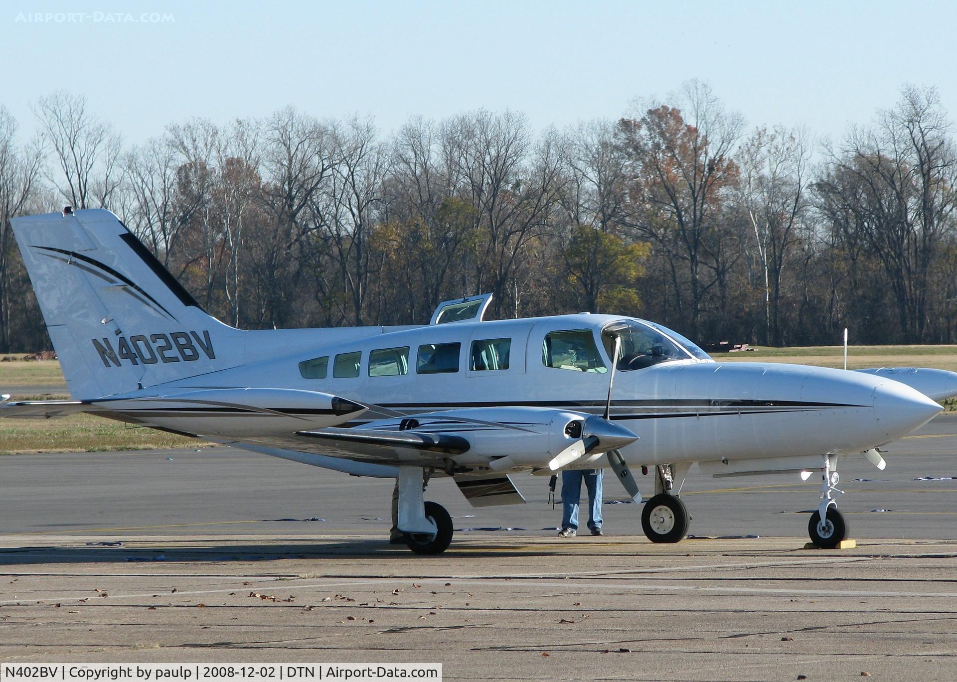 N402BV, 1974 Cessna 402B C/N 402B0825, Parked at Downtown Shreveport.