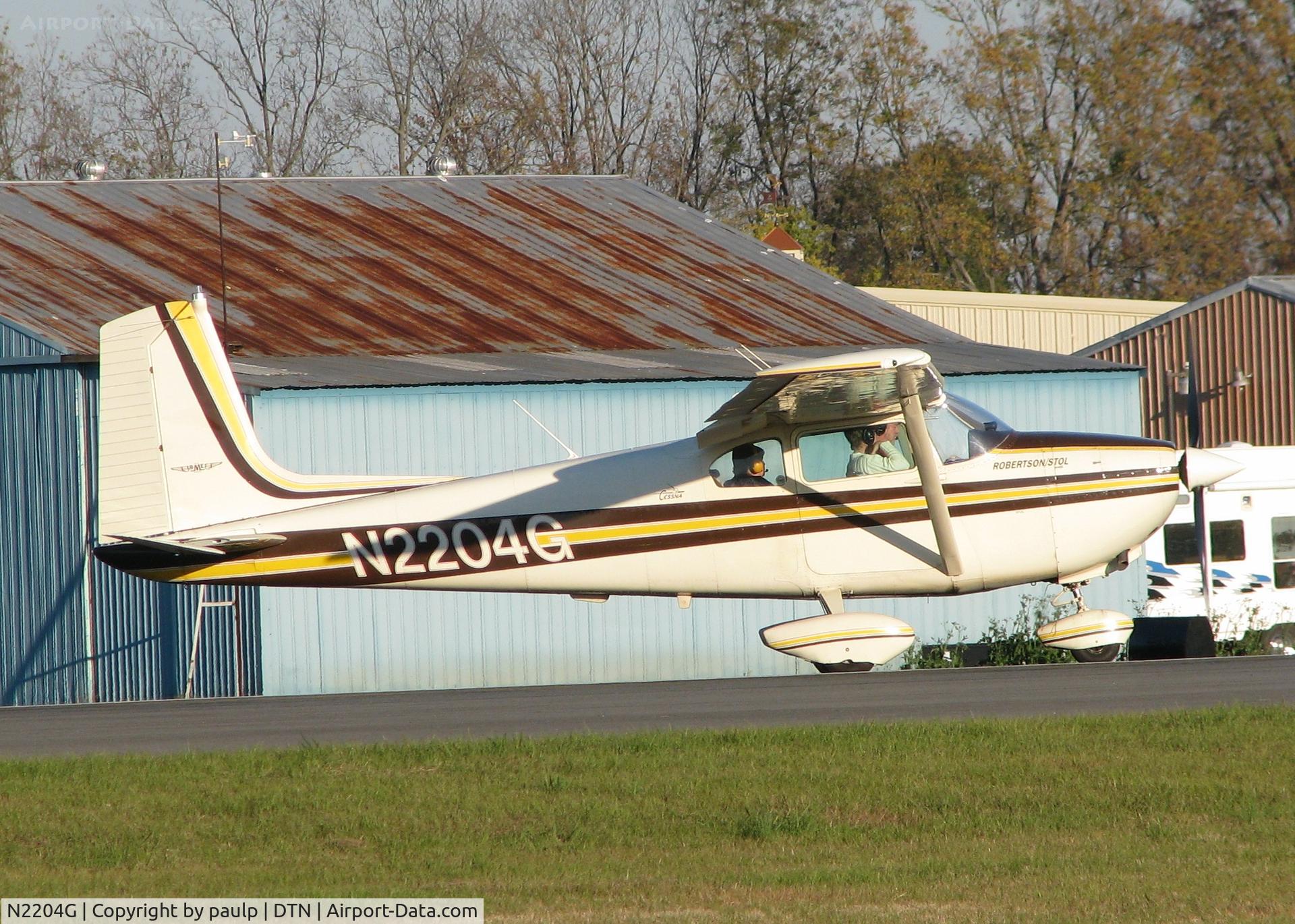N2204G, Cessna 182A Skylane C/N 51504, Taking off from Downtown Shreveport.