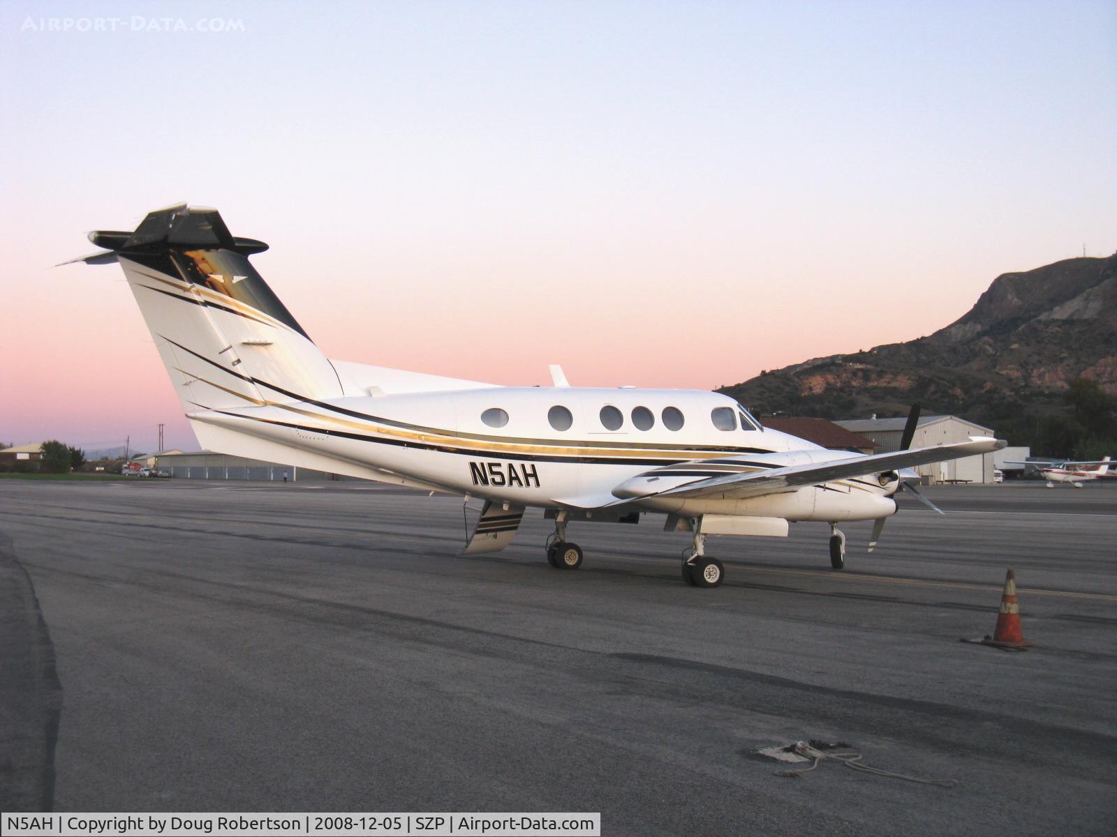 N5AH, 1980 Beech F90 King Air C/N LA-53, 1980 Beech F90 SUPER KING AIR, two P&W(C) PT6A-135 750 shp turboprops, reversible pitch props, T-tail 7/10 seats. Taken at sunset.