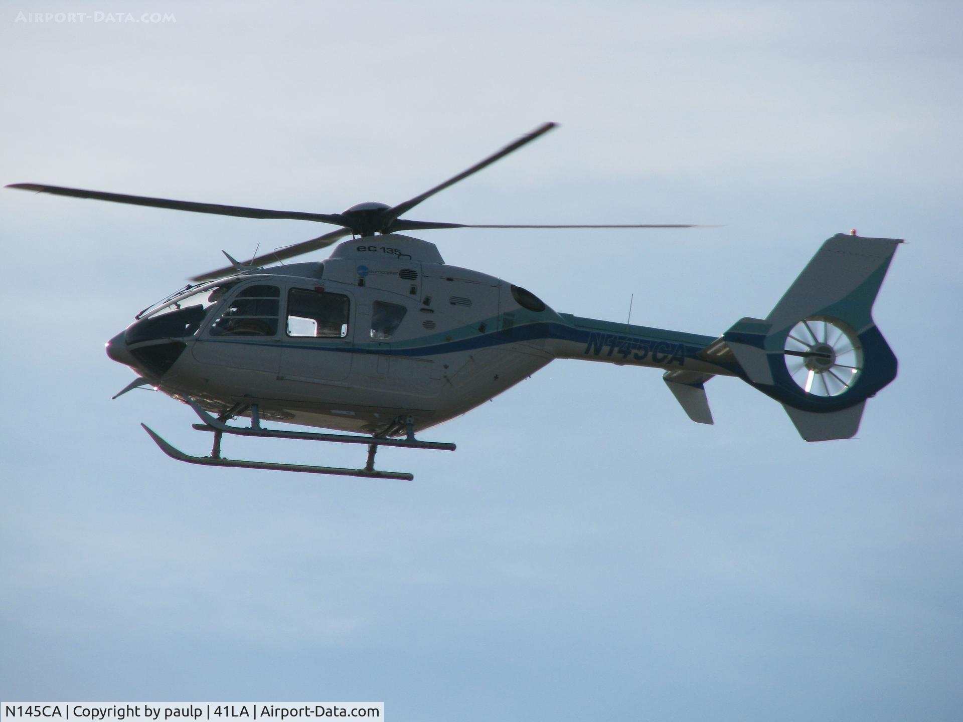 N145CA, 2002 Eurocopter EC-135T-2 C/N 0243, Taking off from Metro Aviation near the Downtown Shreveport airport.