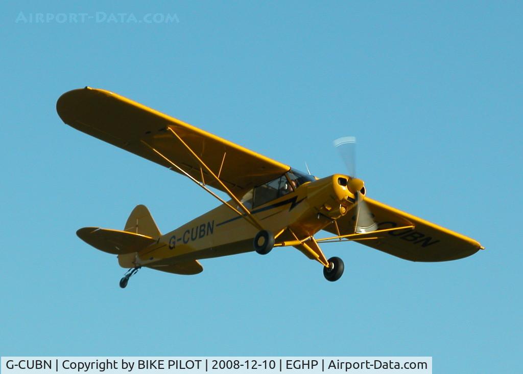G-CUBN, 1962 Piper PA-18-150 Super Cub C/N 18-7902, IMMACULATE CUB CLIMBING OUT FROM RUNWAY 21 POPHAM END OF SEASON FLY-IN.