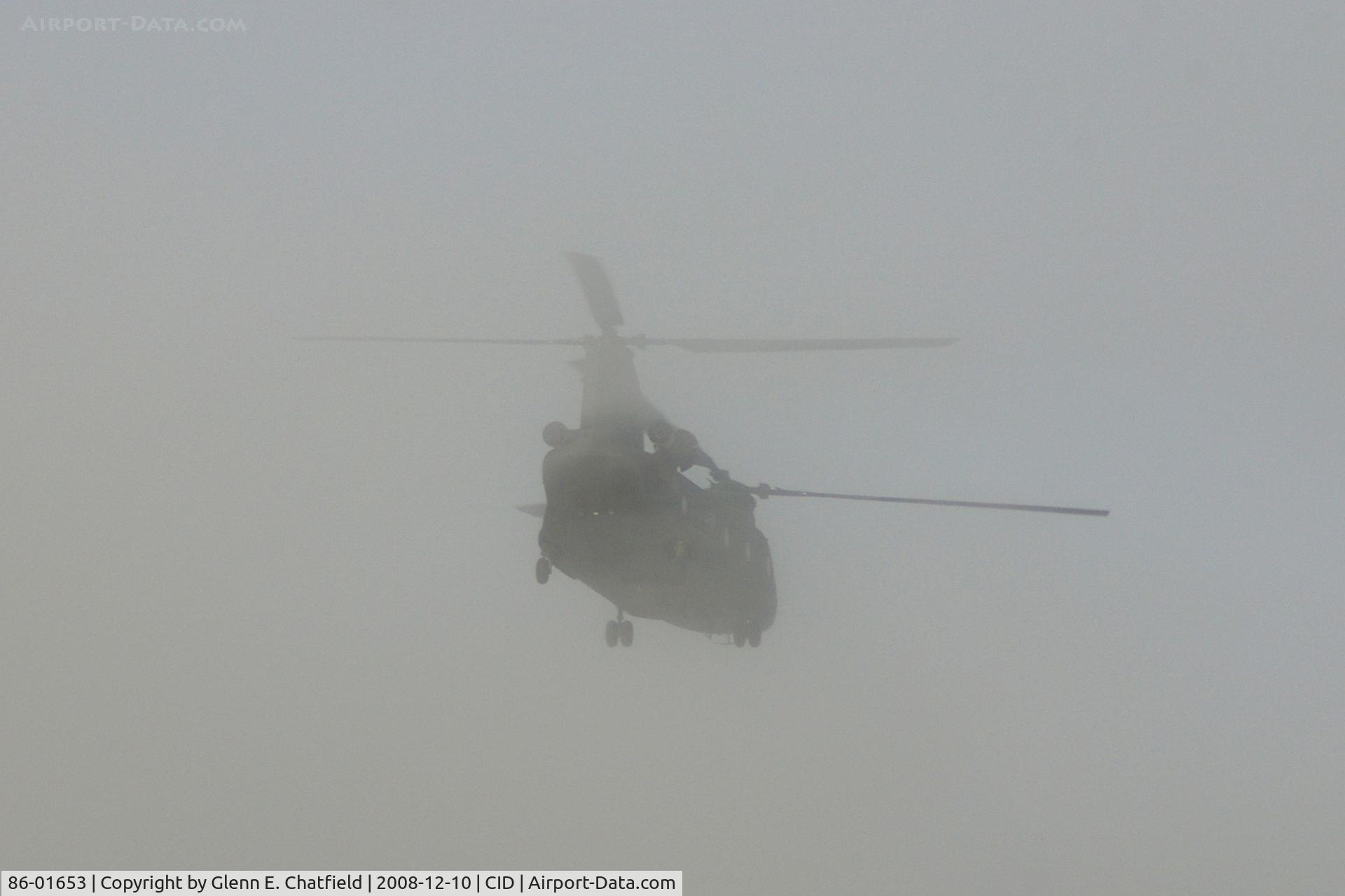 86-01653, 1986 Boeing CH-47D Chinook C/N M.3158, Departing to the north west, entering the low scud