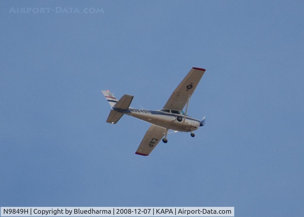 N9849H, 1981 Cessna 182R Skylane C/N 18268068, Civil Air Patrol flying West over Columbine High School, Littleton Colorado.
