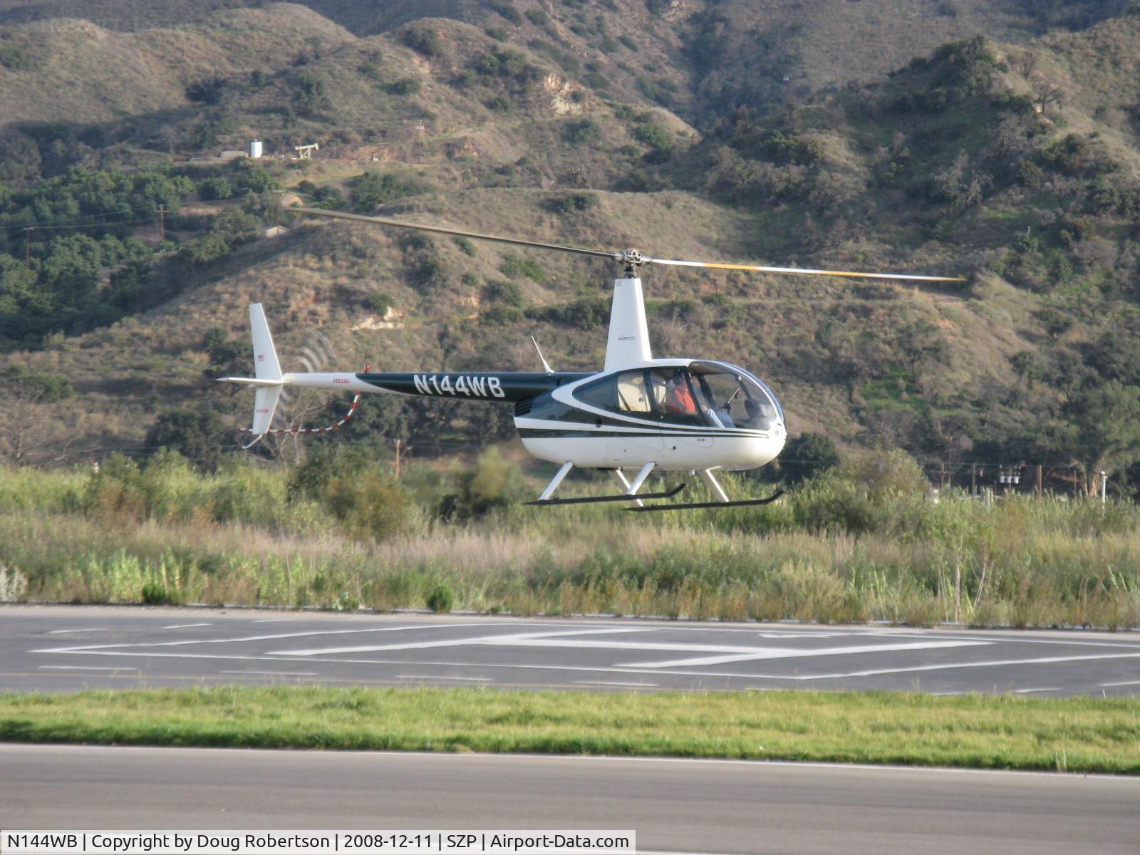 N144WB, 1998 Robinson R44 C/N 0545, 1998 Robinson R44 RAVEN, Lycoming O-540, liftoff after discharging three pasengers