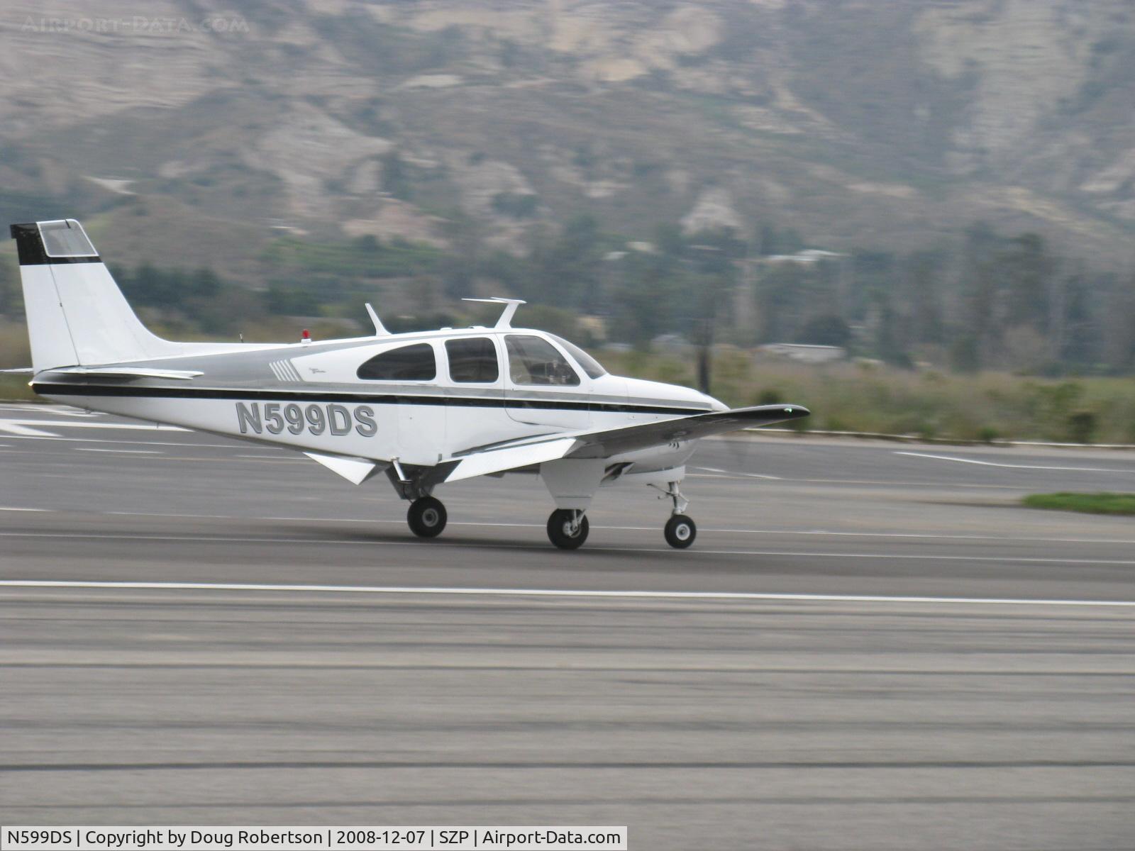 N599DS, 1967 Beech E33A Bonanza C/N CE-182, 1967 Beech E33A BONANZA, Continental IO-520-B 285 Hp, landing roll Rwy 22