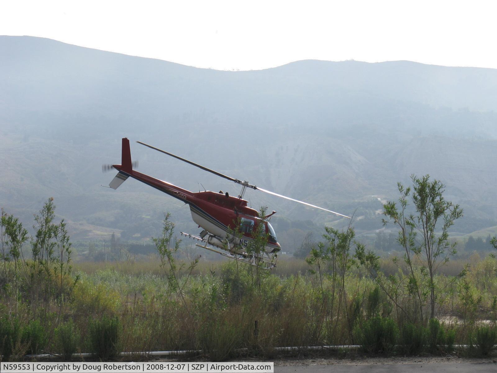 N59553, 1974 Bell 206B JetRanger C/N 1451, 1974 Bell 206B JETRANGER, Allison 250-C20 400 Hp turbine, departure over Santa Clara River.