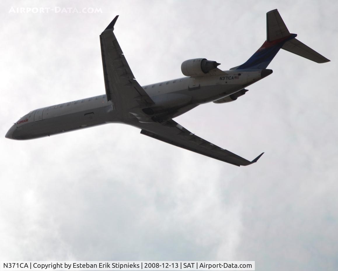N371CA, 2003 Bombardier CRJ-701ER (CL-600-2C10) Regional Jet C/N 10082, Warm Front causing strong surface headwinds 12R