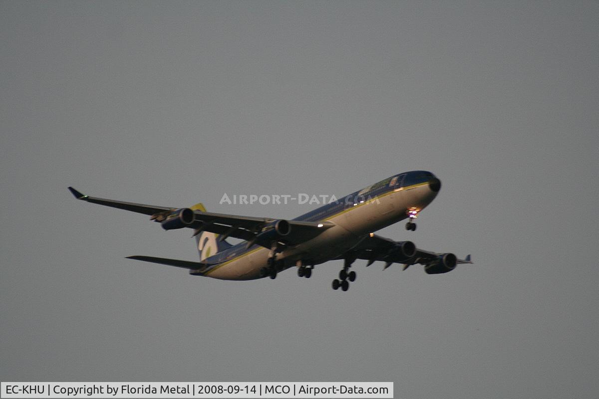 EC-KHU, Airbus A340-312 C/N 007, Picture came out lousy in the twilight, sorry about the terrible quality - I hate posting it like this, but this will probably be my only chance to get an Air Comet A340 at MCO since they discontinued service to MCO, and this was the only time they came i