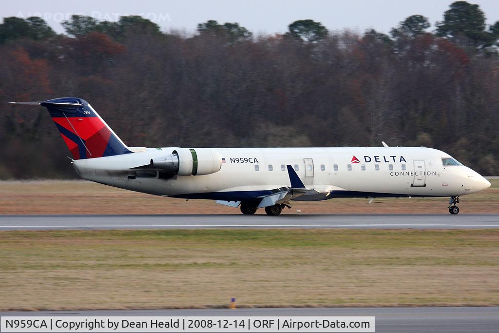 N959CA, 1996 Canadair CRJ-100ER (CL-600-2B19) C/N 7116, Delta Connection (Comair) N959CA (FLT COM1336) rolling out on RWY 23 after arrival from Cincinatti Northern Kentucky Int'l (KCVG).