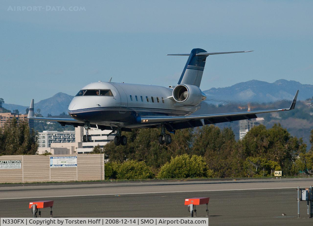 N330FX, 2001 Bombardier Challenger 604 (CL-600-2B16) C/N 5487, N330FX arriving on RWY 21