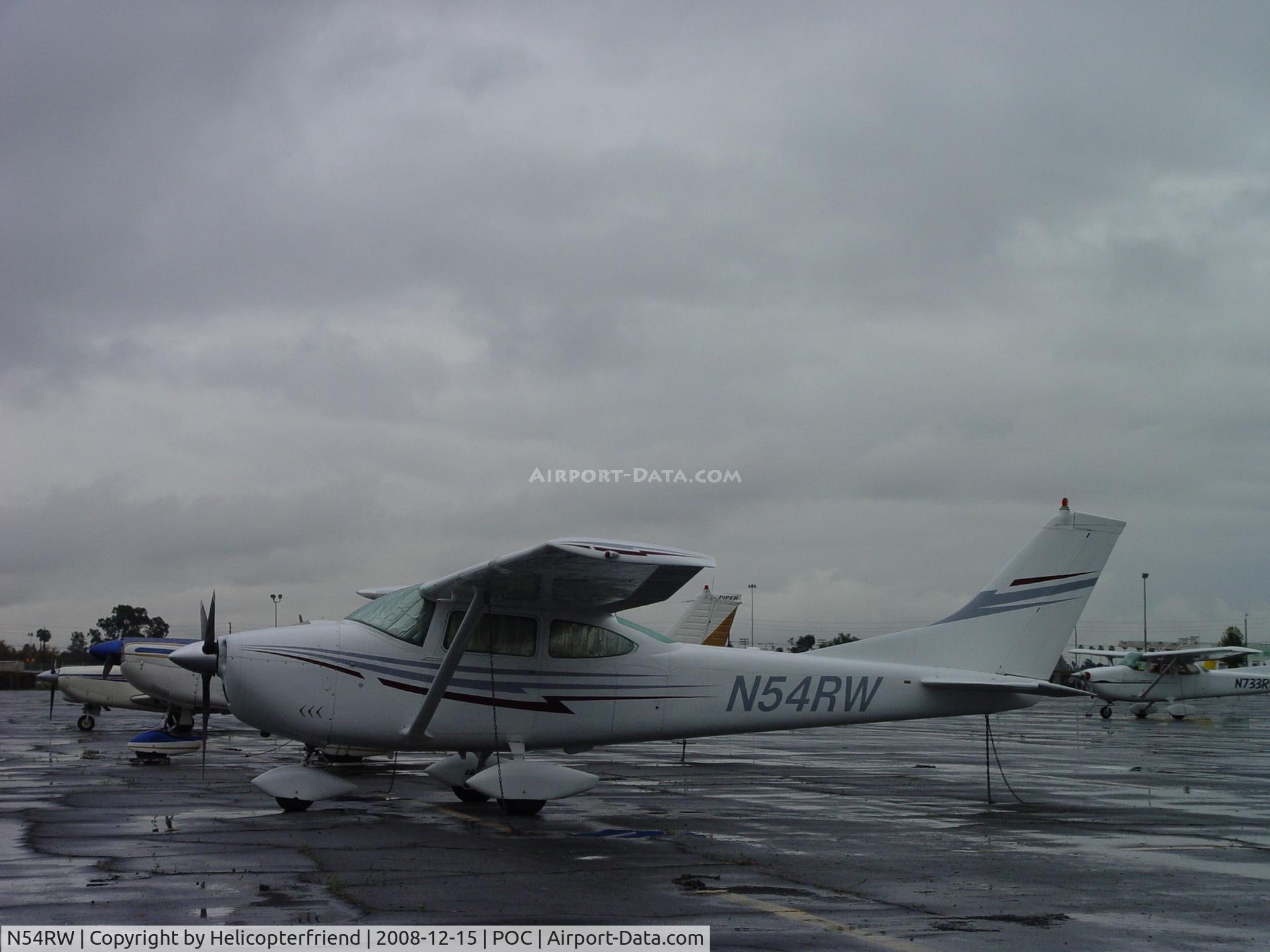 N54RW, 1966 Cessna 182J Skylane C/N 18256924, Parked in the rain a Brackett
