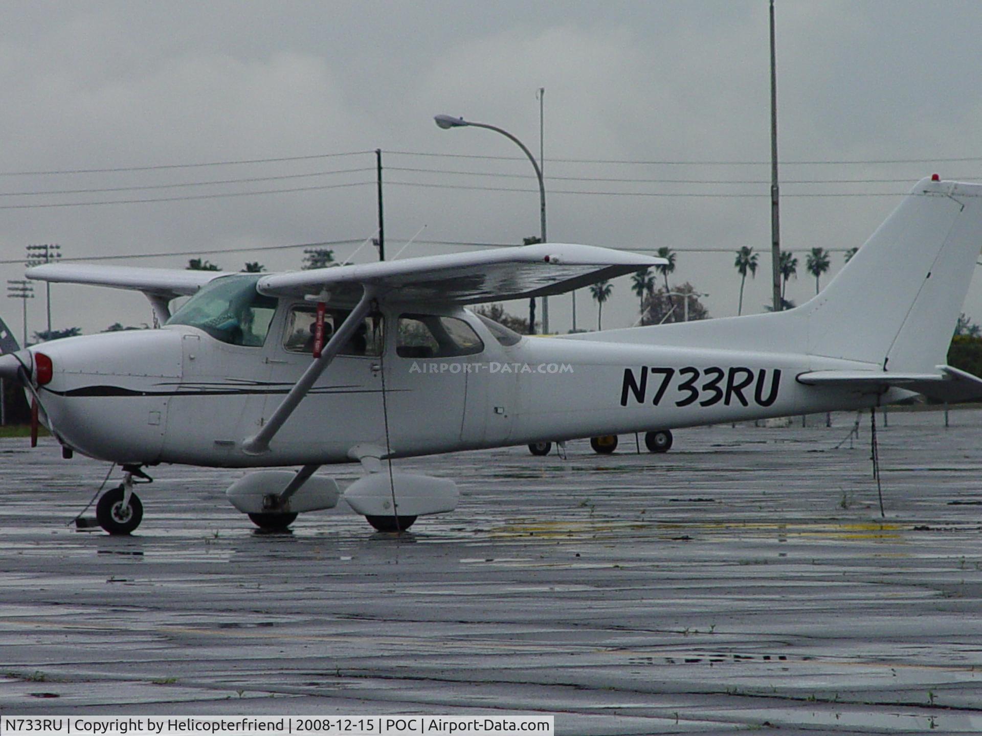 N733RU, 1977 Cessna 172N C/N 17268497, Parked in the rain at Brackett