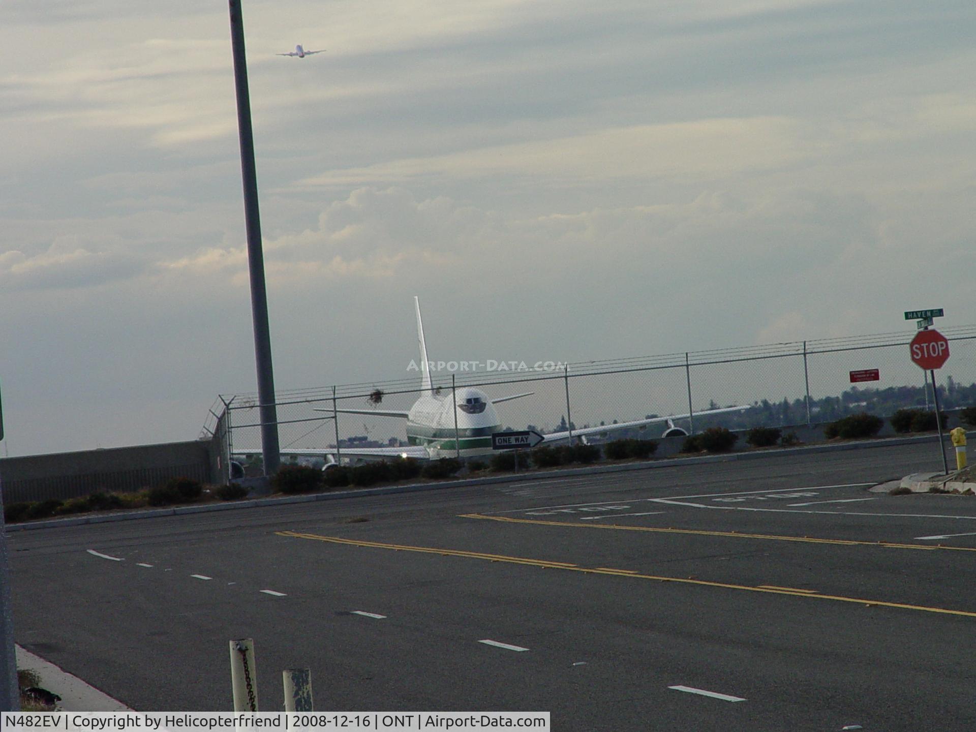 N482EV, 1973 Boeing 747-212B C/N 20713, Eastbound to UPS parking entrance SW flight departing