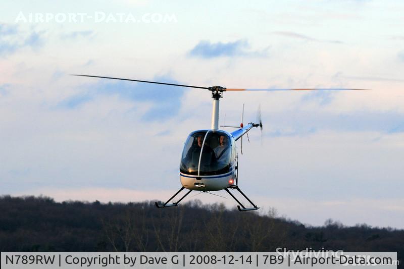 N789RW, 1994 Robinson R22 BETA C/N 2450, Accelerating down the runway just before sunset at Ellington, CT.
