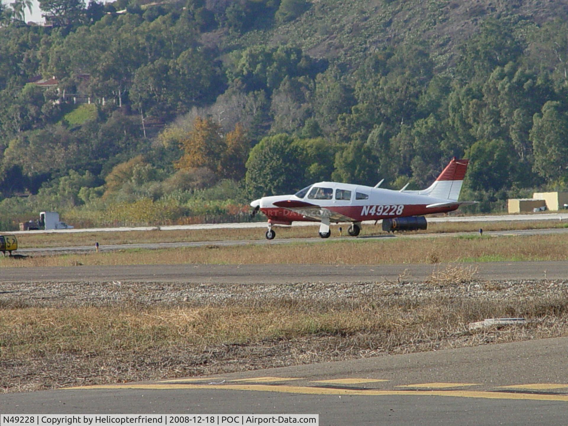 N49228, 1976 Piper PA-28R-200 C/N 28R-7635459, Waiting permission to cross runway