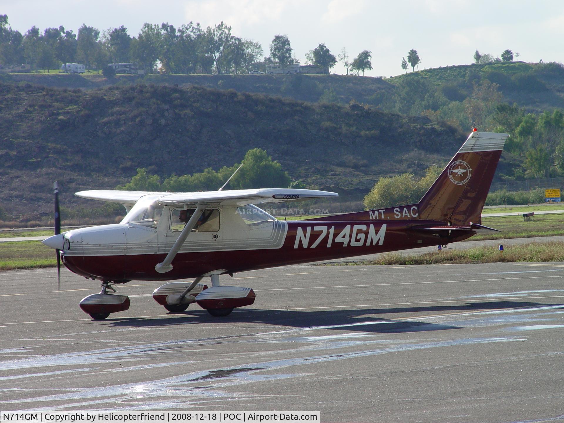 N714GM, Cessna 150M C/N 15079165, Waiting their turn for take off at Brackett 8L