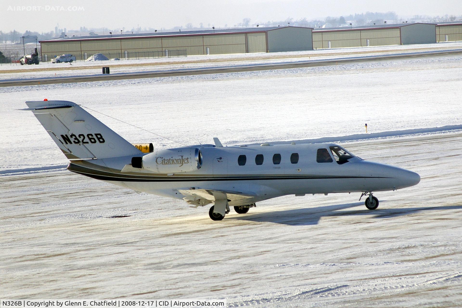 N326B, 1999 Cessna 525 CitationJet CJ1 C/N 525-0302, Taxiing to Landmark FBO, as seen from my office window.