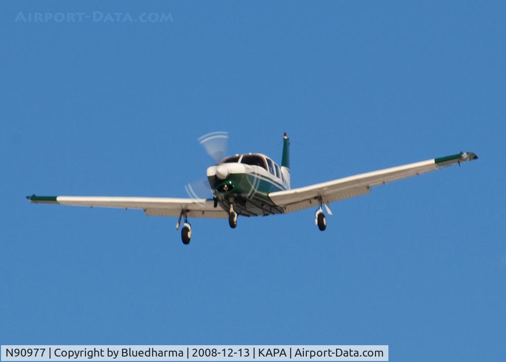 N90977, 1981 Piper PA-32R-301T Turbo Saratoga C/N 32R-8129048, Landing on 17L on a very windy day.