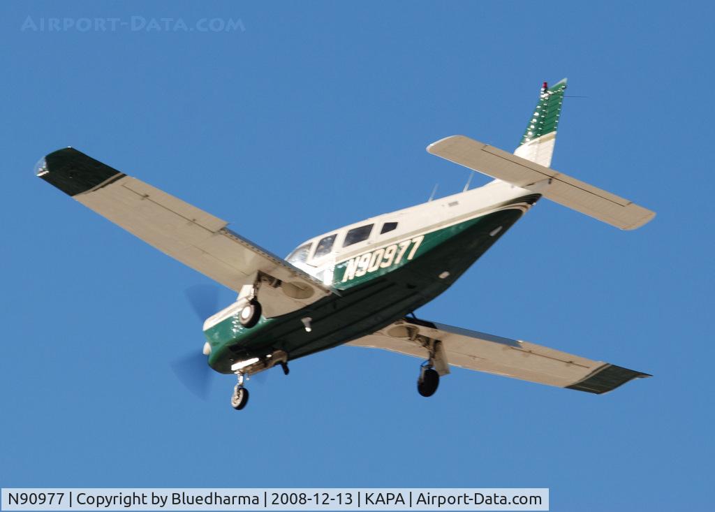 N90977, 1981 Piper PA-32R-301T Turbo Saratoga C/N 32R-8129048, Landing on 17L on a very windy day.
