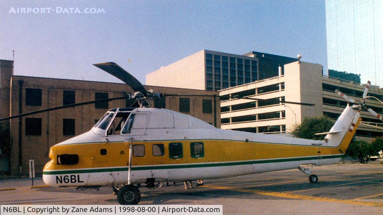 N6BL, 1962 Sikorsky S-58ET C/N 58-1567, In Downtown Fort Worth for a high rise lift project.