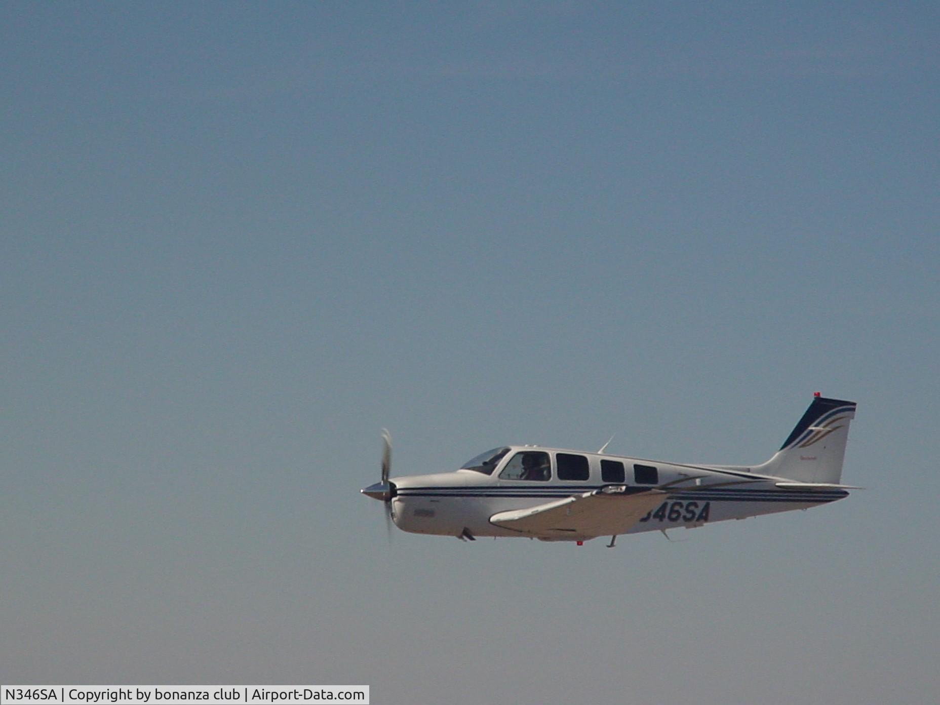 N346SA, 2002 Raytheon Aircraft Company A36 Bonanza C/N E-3450, picture in the air on the way to bahamas