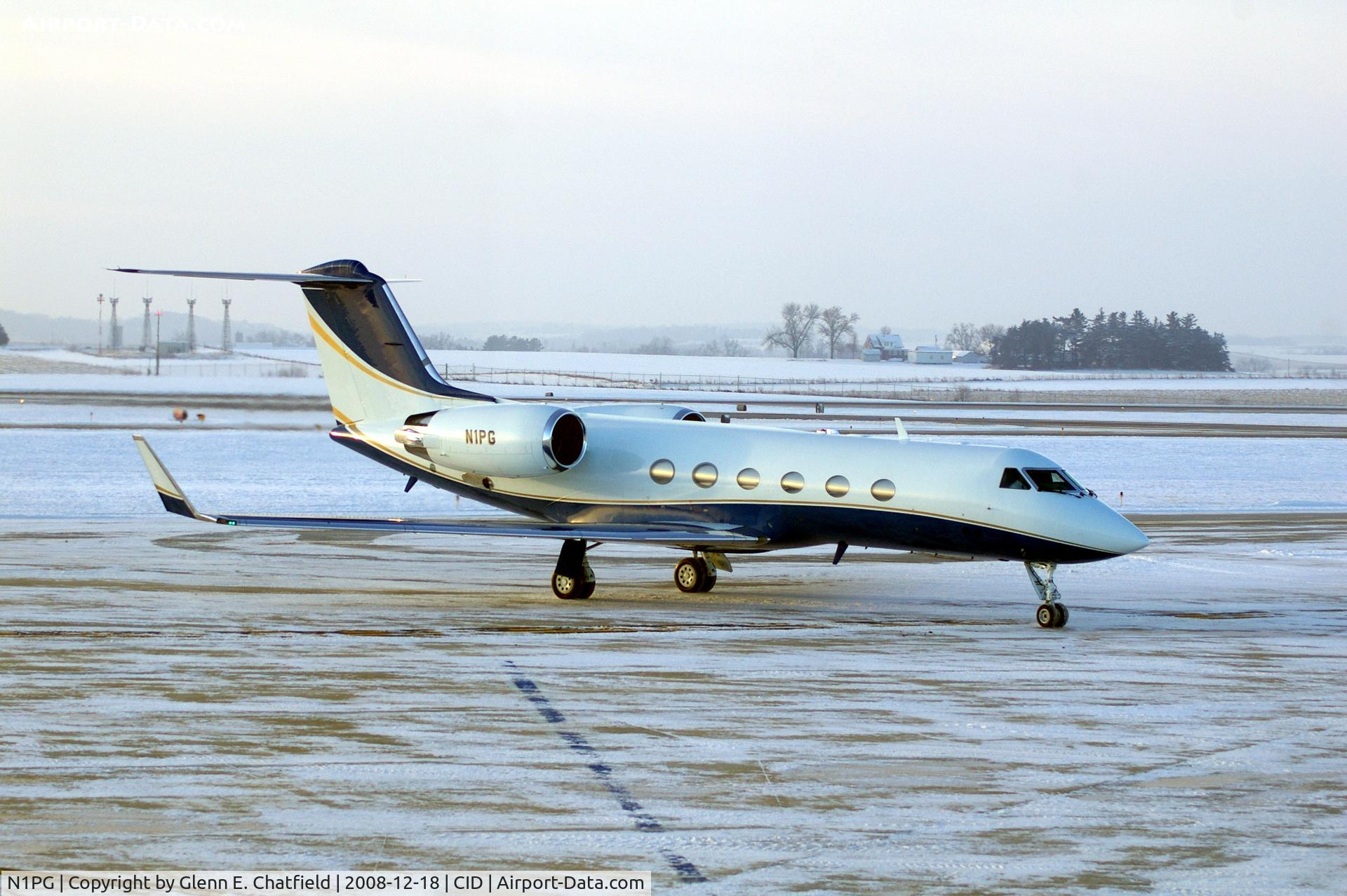 N1PG, 1999 Gulfstream Aerospace G-IV C/N 1374, Just before sunrise. Taxiing past the tower to Landmark FBO.  The next shot would have been outstanding if I had my wide-angle on!  The one that got away.