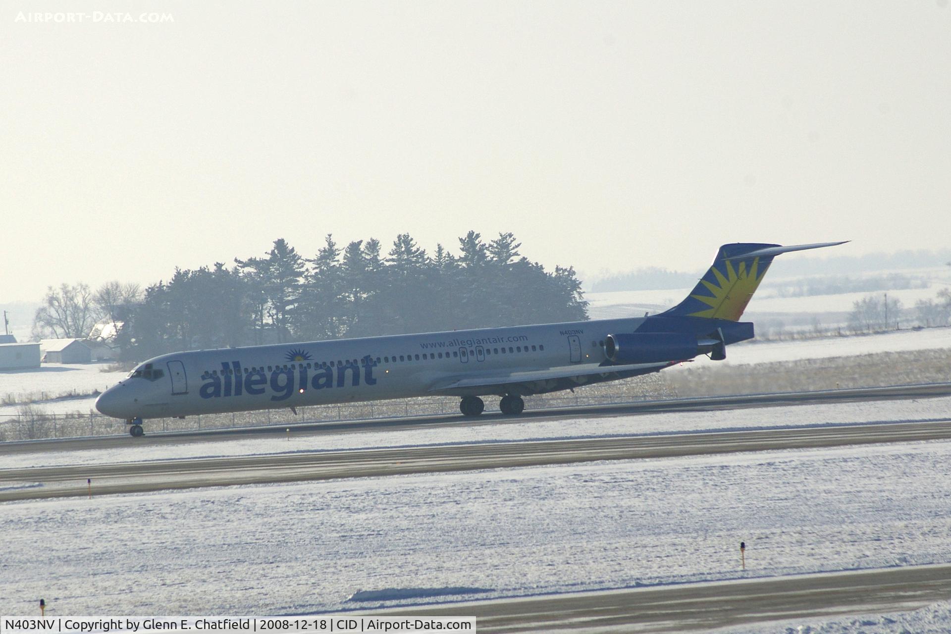 N403NV, 1989 McDonnell Douglas MD-88 C/N 49764, Landing runway 9.  I'm looking into the snow, haze and sun!