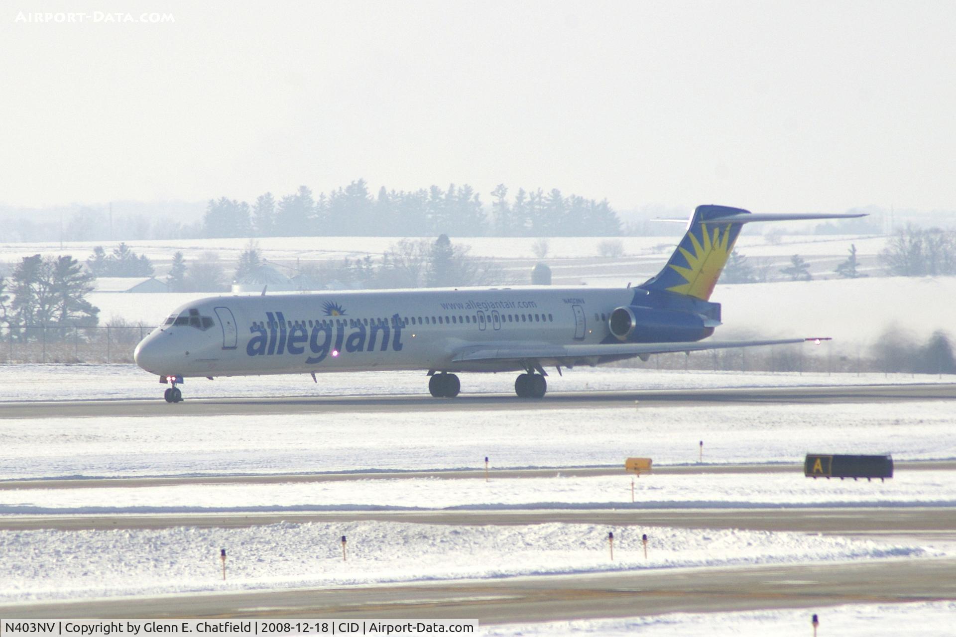 N403NV, 1989 McDonnell Douglas MD-88 C/N 49764, On take-off roll Runway 9.  I'm looking into the snow, haze and sun!