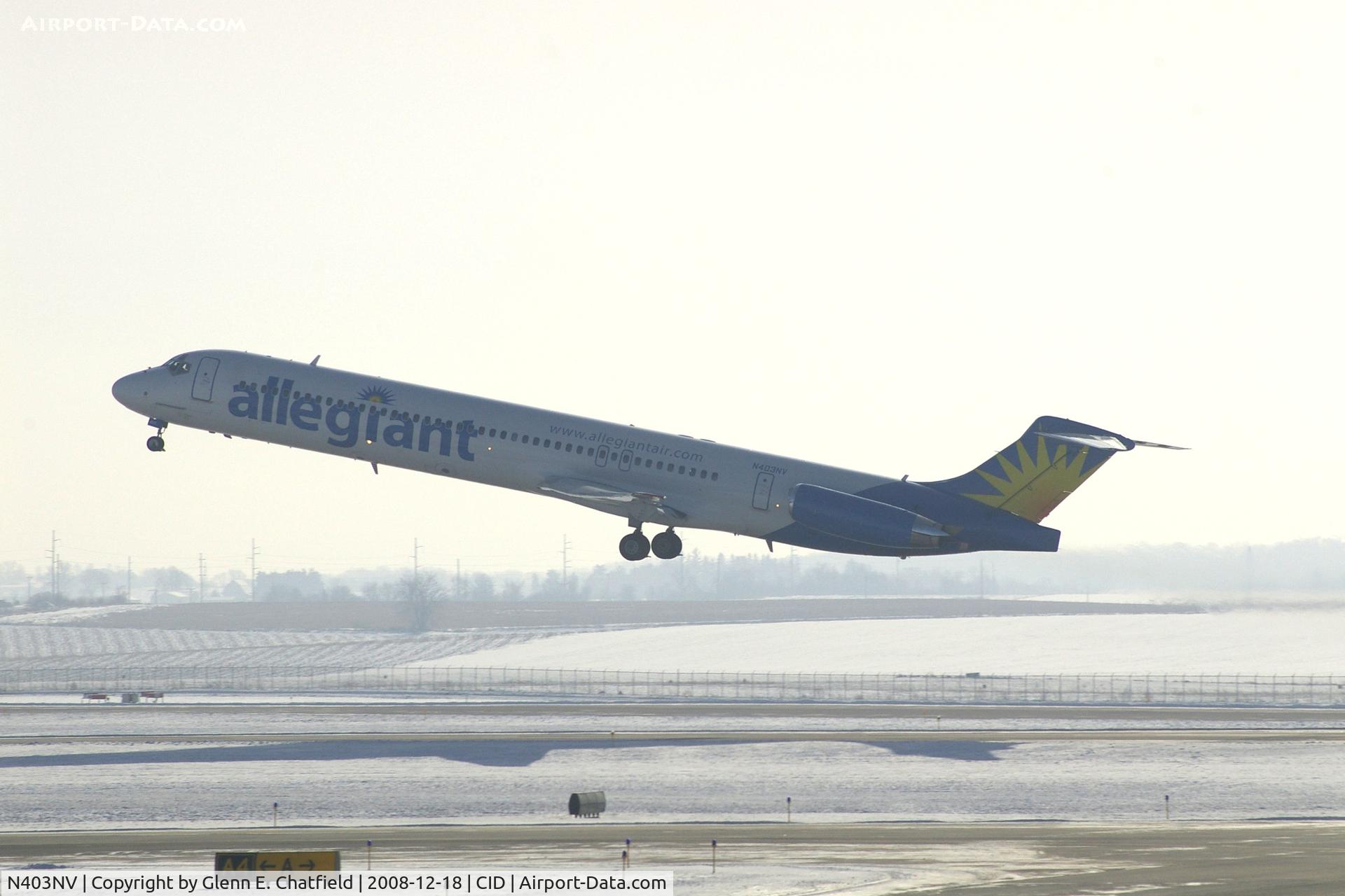 N403NV, 1989 McDonnell Douglas MD-88 C/N 49764, Departing Runway 9.  I'm looking into the snow, haze and sun!