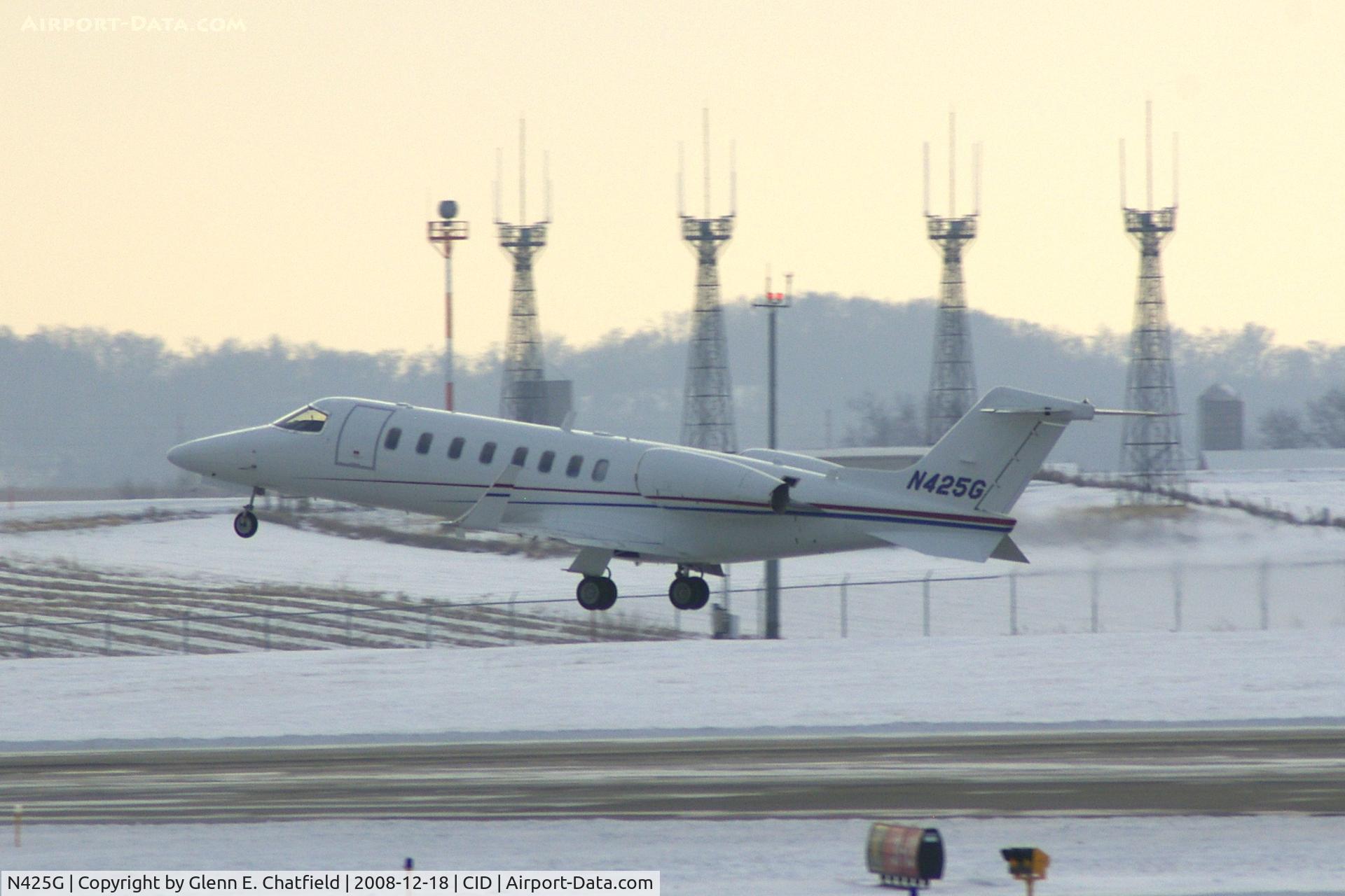 N425G, 2006 Learjet Inc 45 C/N 307, Departing runway 13.  Background are the tower's communications antennae