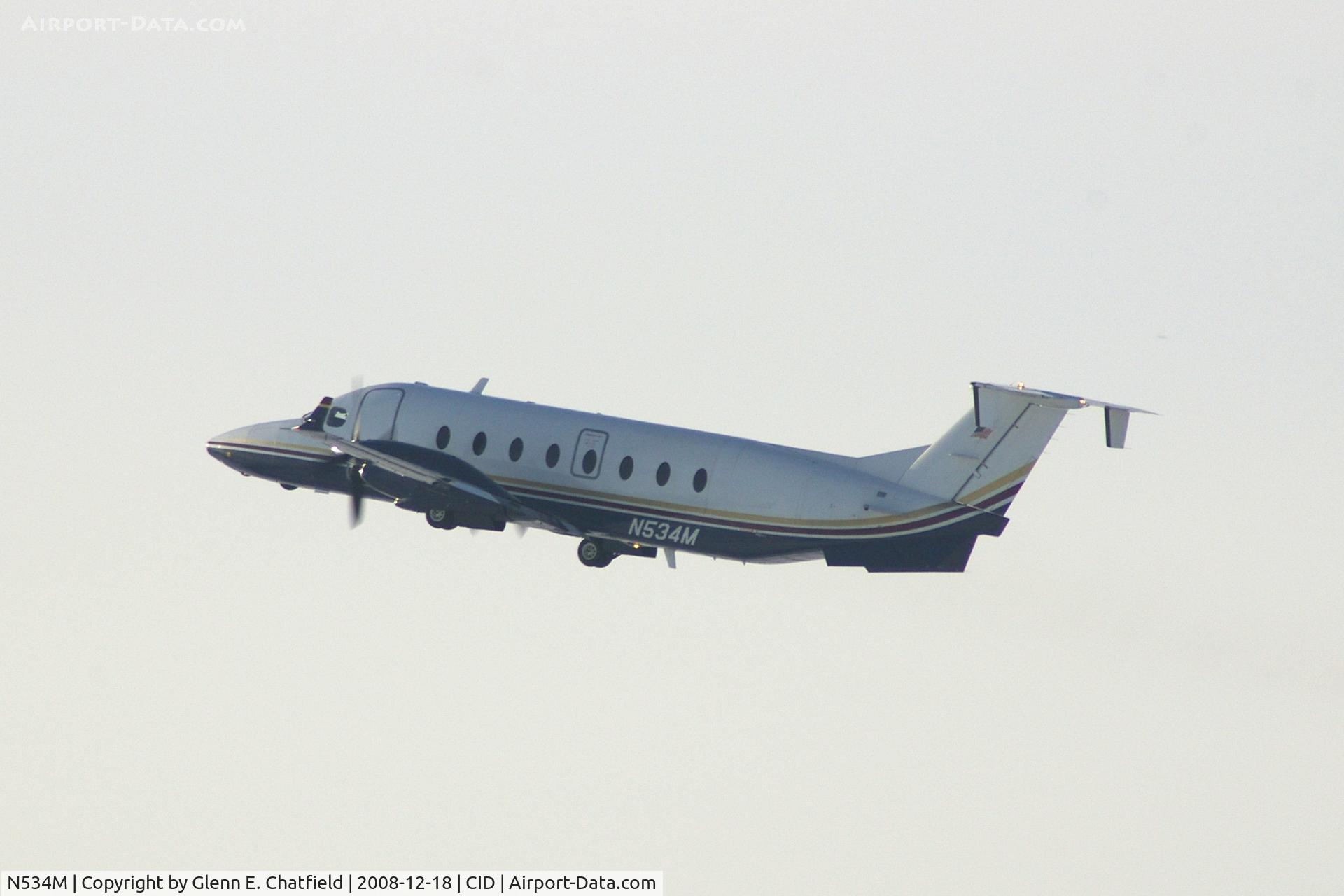 N534M, 1998 Raytheon 1900D C/N UE-333, Departing runway 13, as seen from my office in the tower.