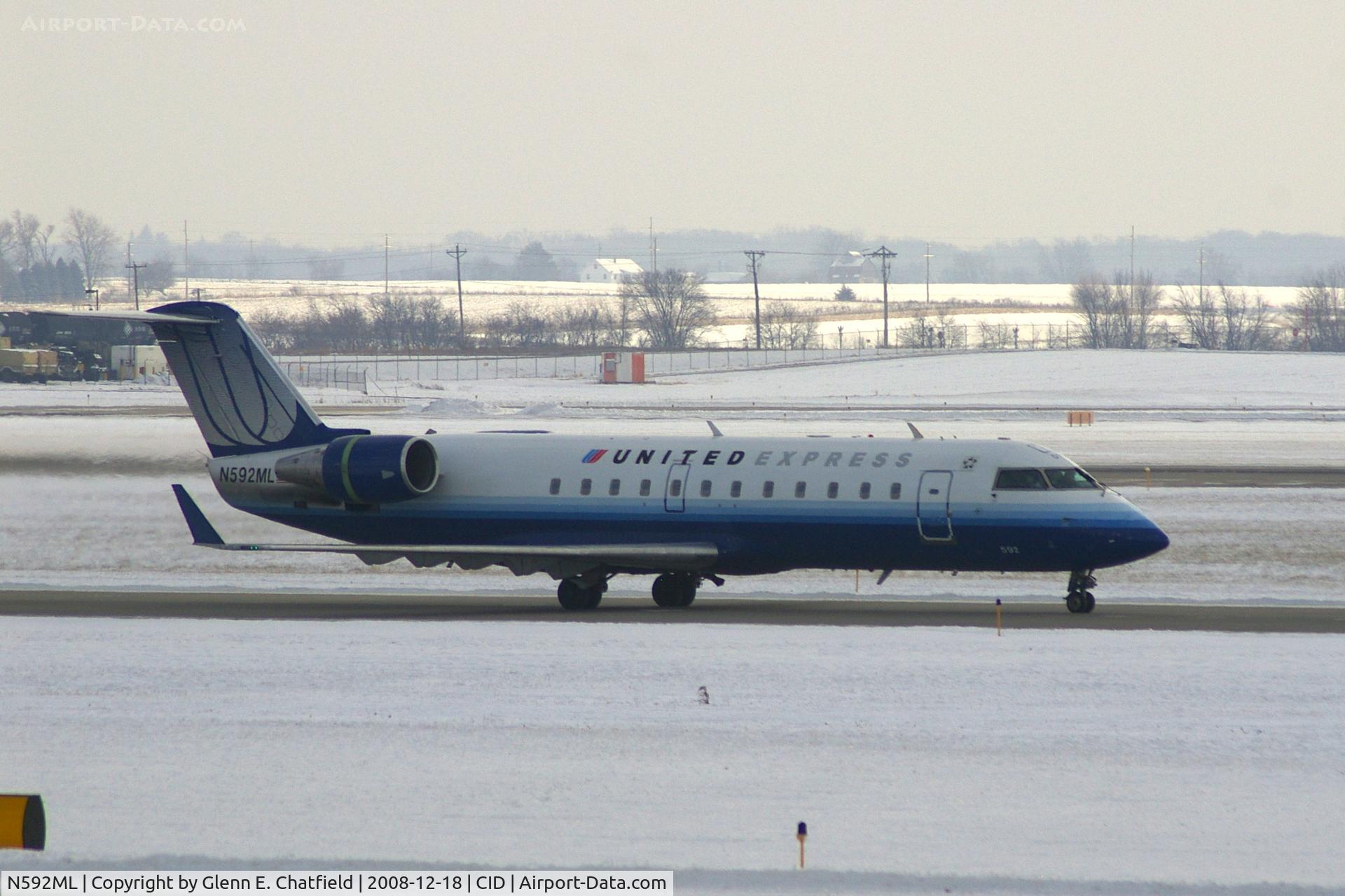 N592ML, 2000 Bombardier CRJ-200ER (CL-600-2B19) C/N 7410, Taxiing to Runway 9 for departure