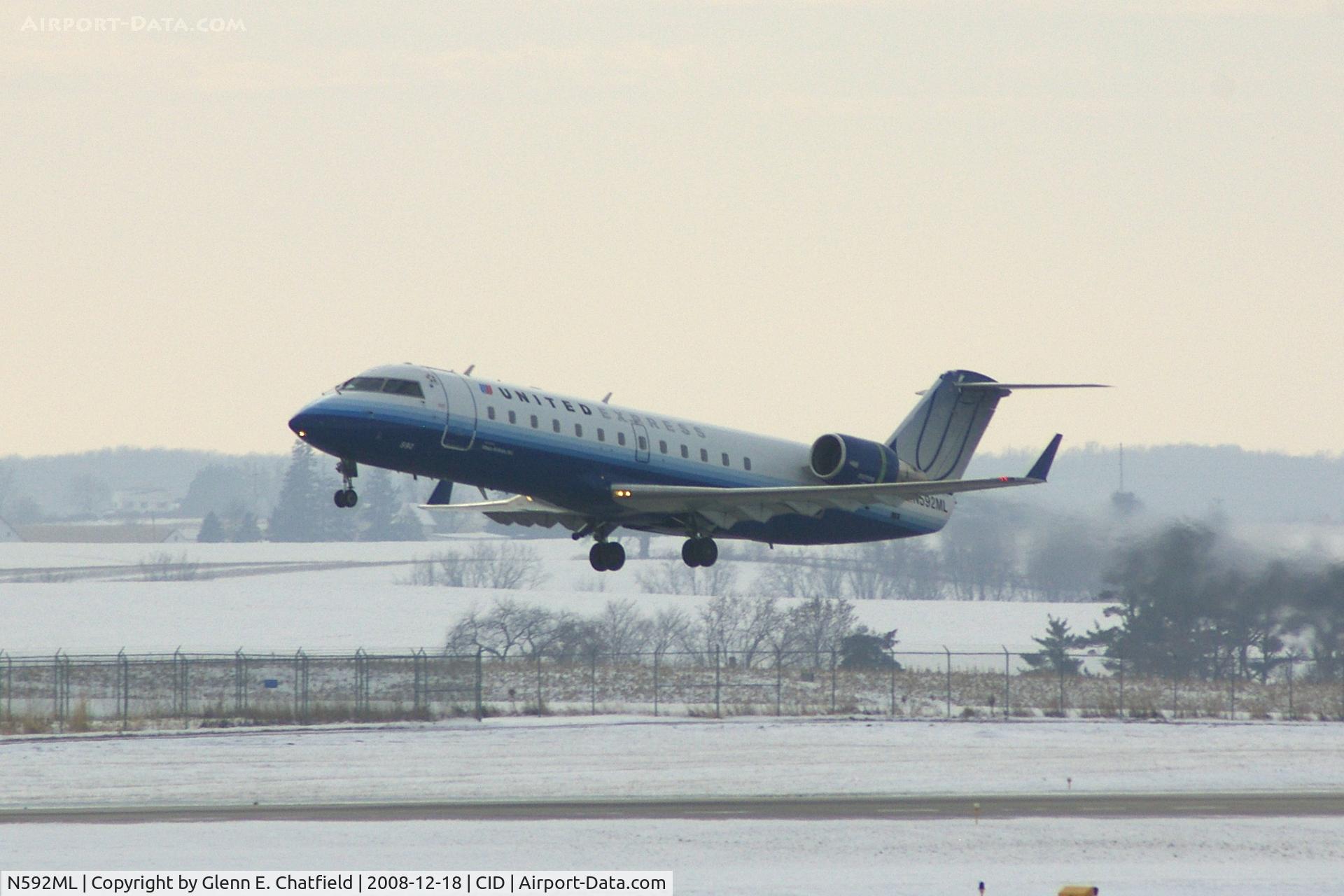 N592ML, 2000 Bombardier CRJ-200ER (CL-600-2B19) C/N 7410, Departing Runway 9.