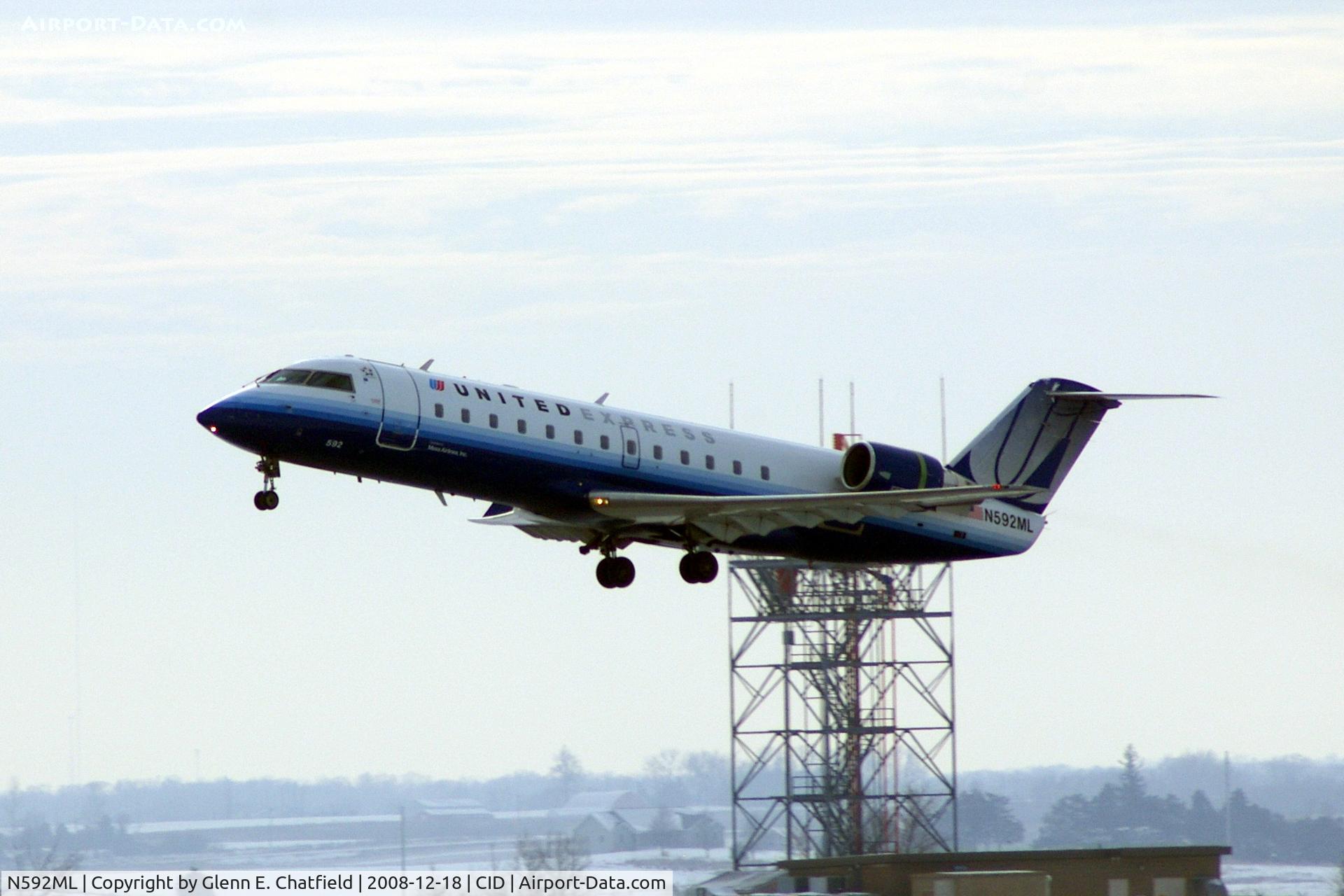 N592ML, 2000 Bombardier CRJ-200ER (CL-600-2B19) C/N 7410, Departing Runway 9.