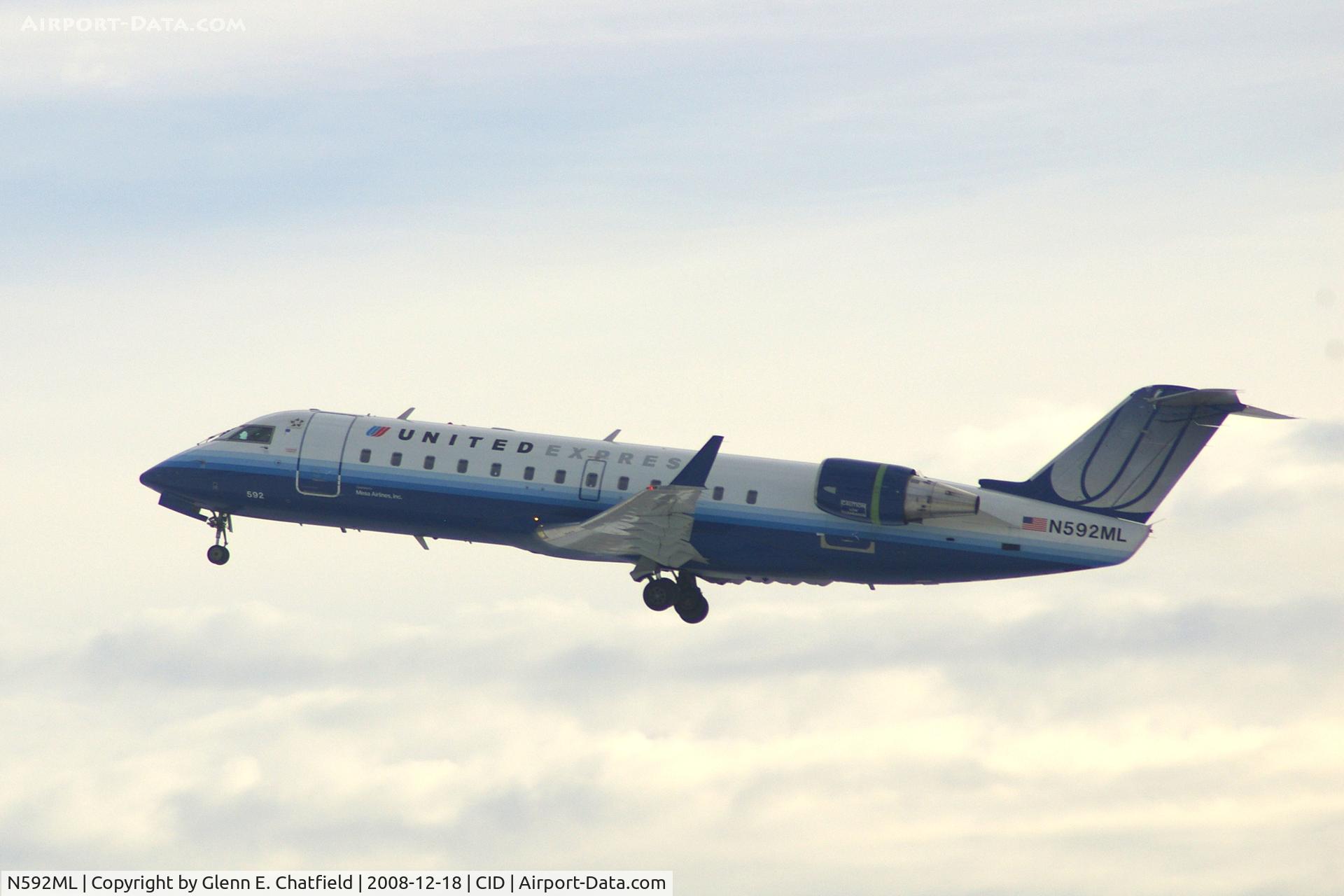 N592ML, 2000 Bombardier CRJ-200ER (CL-600-2B19) C/N 7410, Departing Runway 9.  On the way to O'Hare International