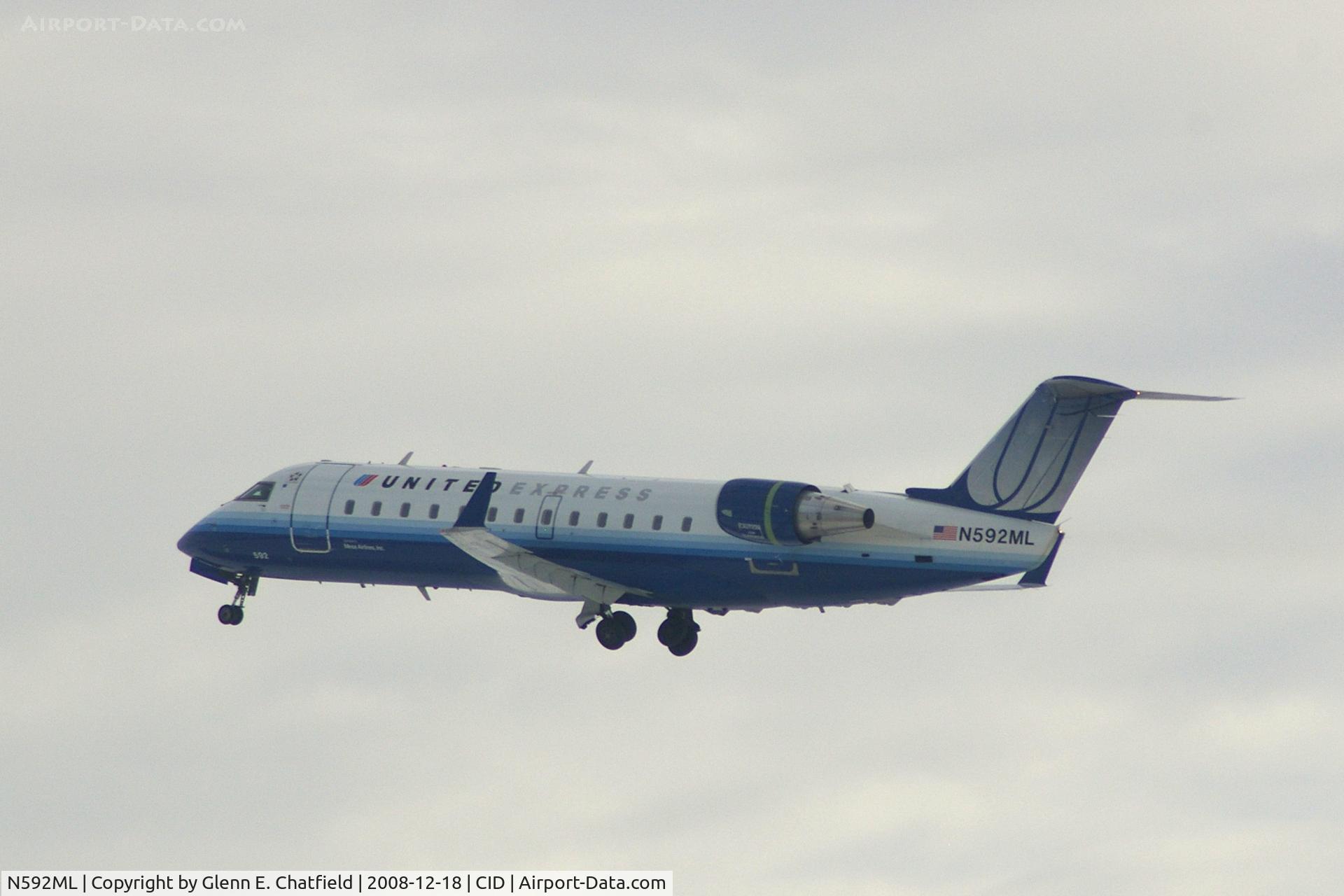 N592ML, 2000 Bombardier CRJ-200ER (CL-600-2B19) C/N 7410, Landing gear coming up.  On the way to O'Hare International