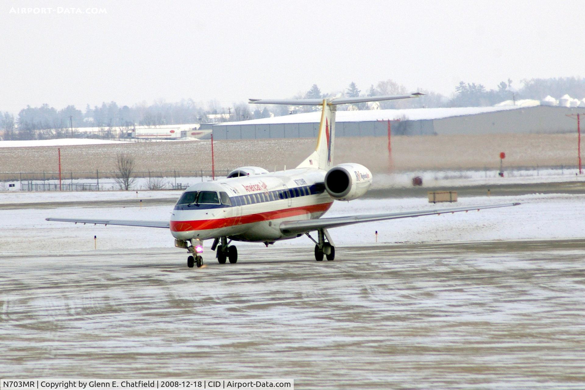 N703MR, 1999 Embraer ERJ-135LR (EMB-135LR) C/N 145173, Turning onto the terminal ramp from Alpha 5