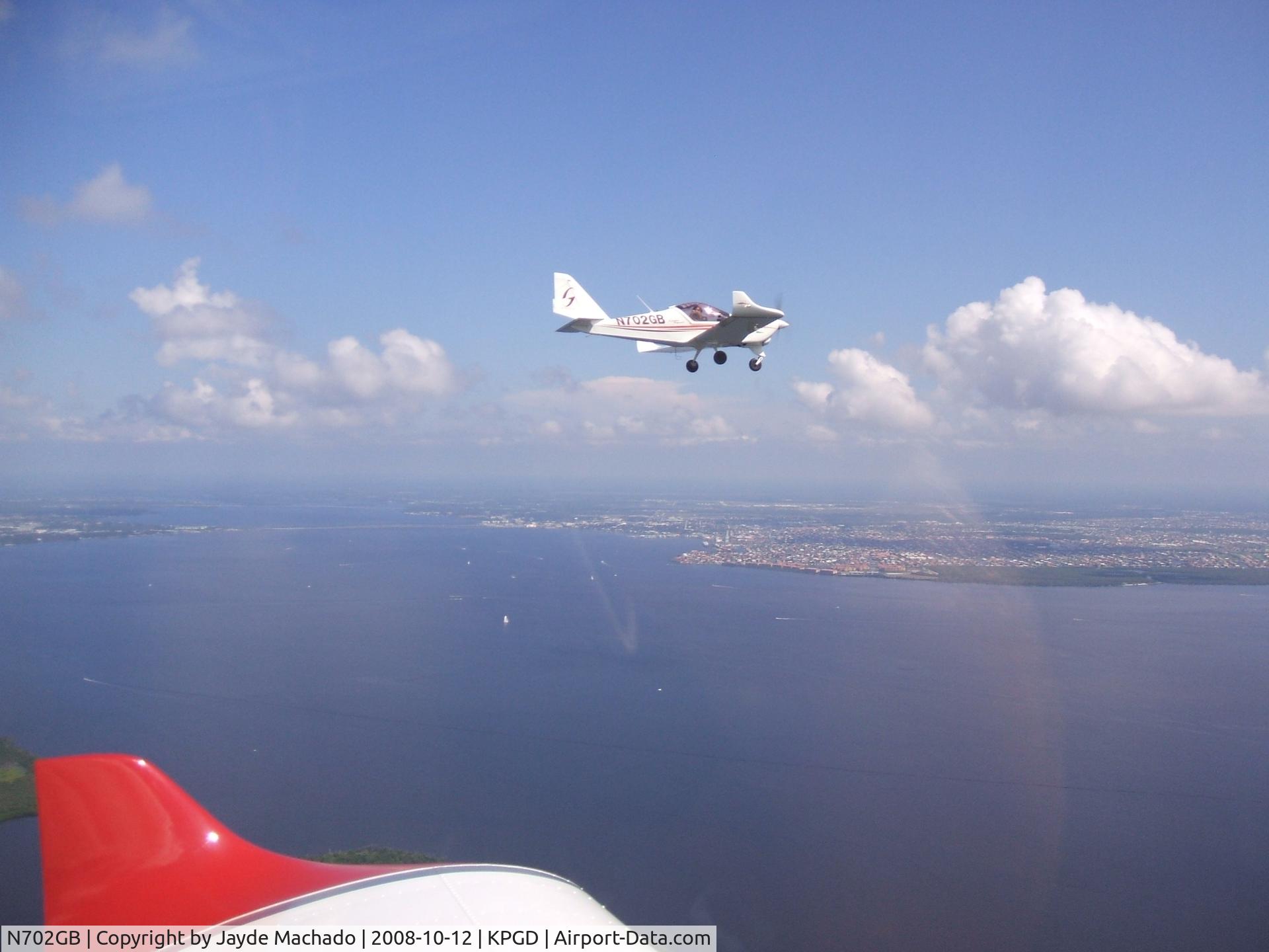 N702GB, 2007 Aero AT-4 LSA C/N AT4-002, In formation with N708GB over Charlotte Harbor KPGD