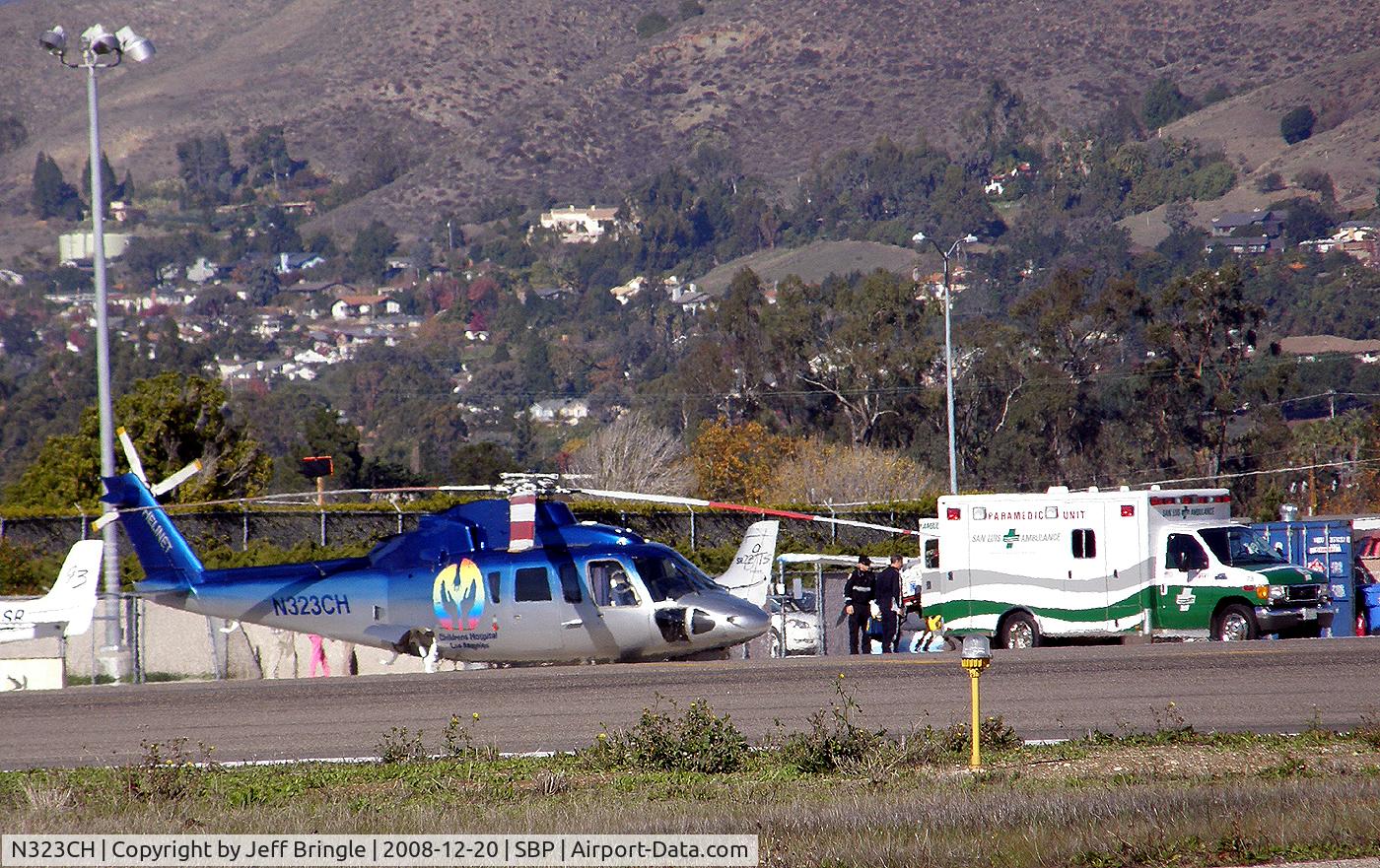 N323CH, 1980 Sikorsky S-76A C/N 760095, Just prior to patient transfer from ambulance.