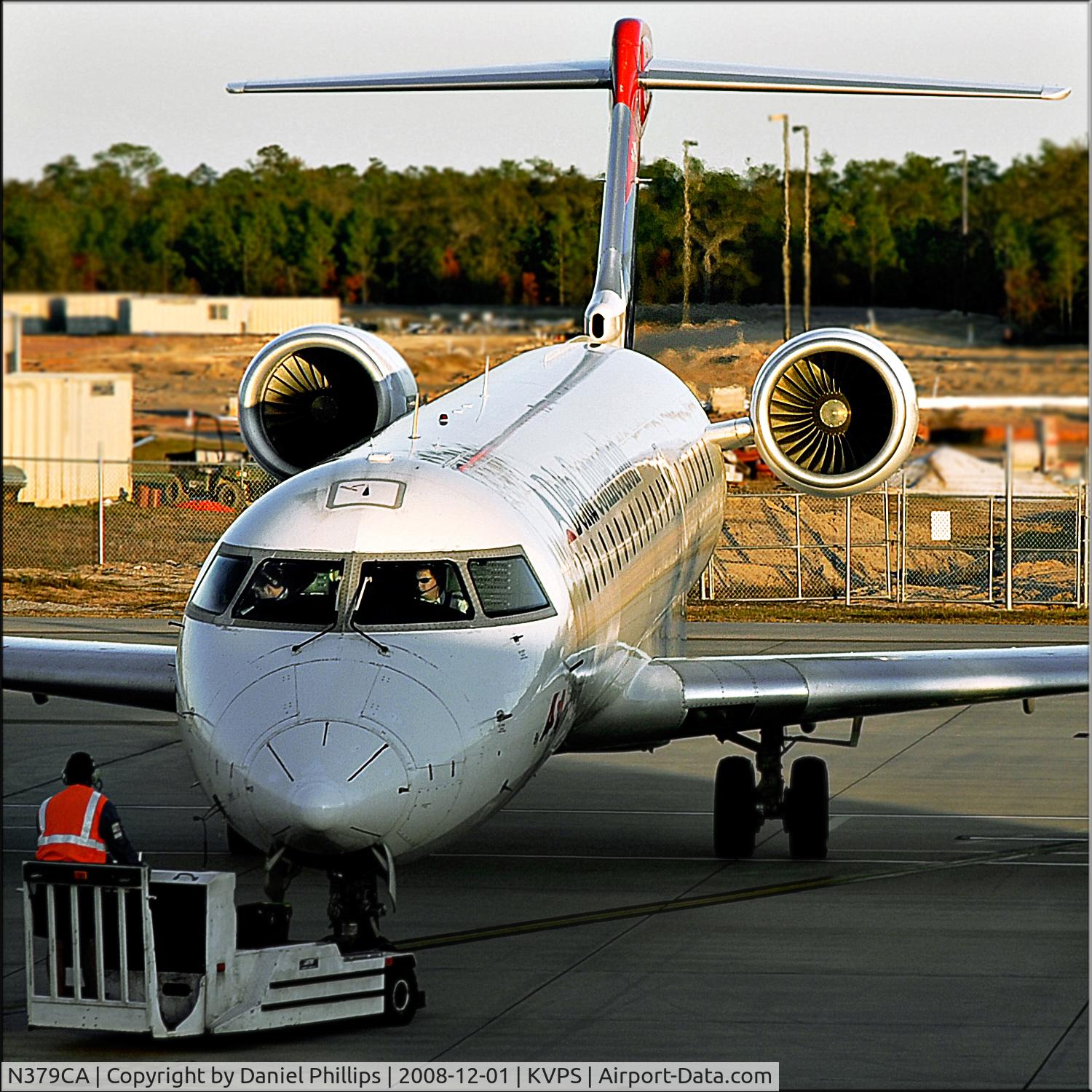 N379CA, 2003 Bombardier CRJ-701ER (CL-600-2C10) Regional Jet C/N 10102, Photo inside building gate b2