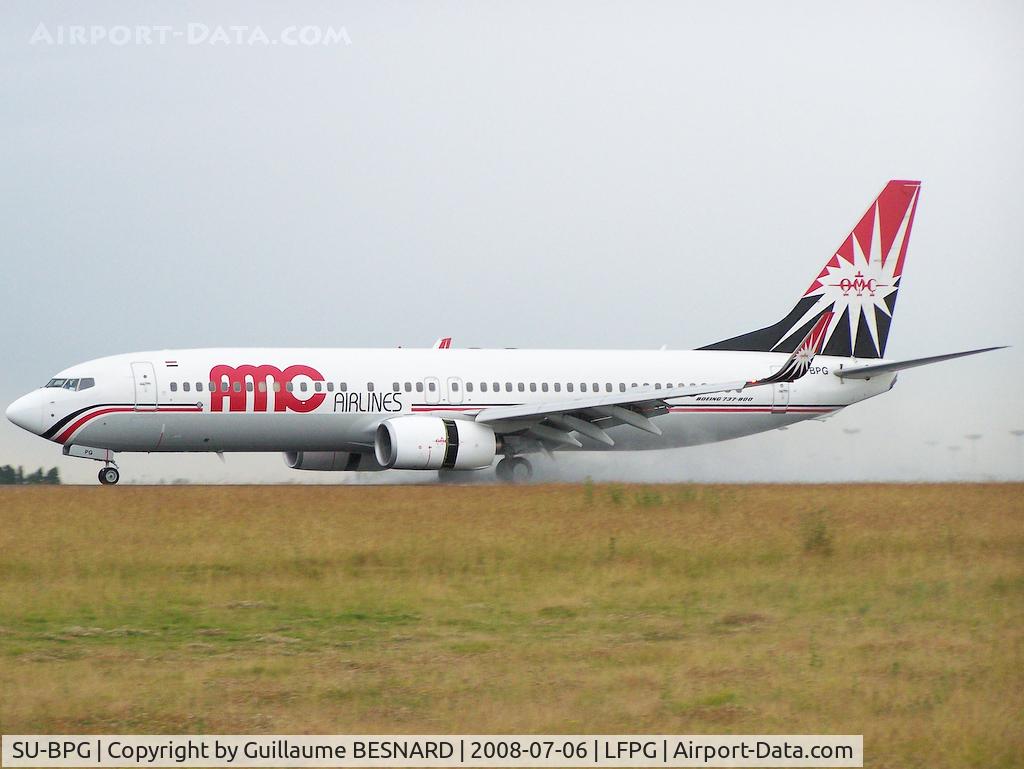 SU-BPG, 2006 Boeing 737-86N C/N 32669, Landing 09L, under rain very early in the morning.