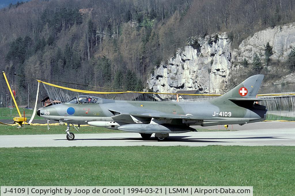 J-4109, Hawker Hunter F.58A C/N HABL-003094, In 1994 we were allowed to take pictures from the base side of the airfield. The net barrier can be seenin the background.