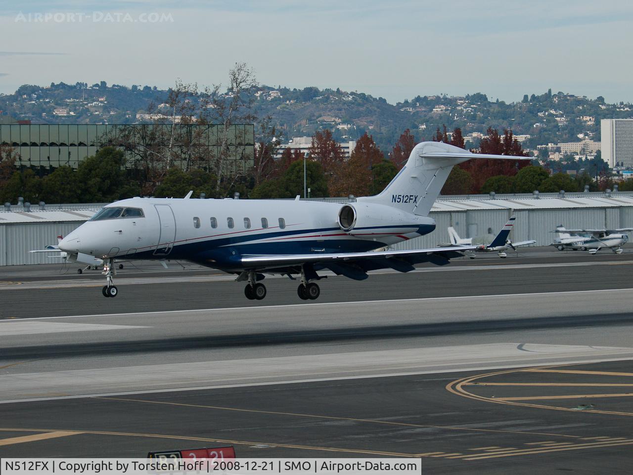 N512FX, 2004 Bombardier Challenger 300 (BD-100-1A10) C/N 20022, N512FX arriving on RWY 21