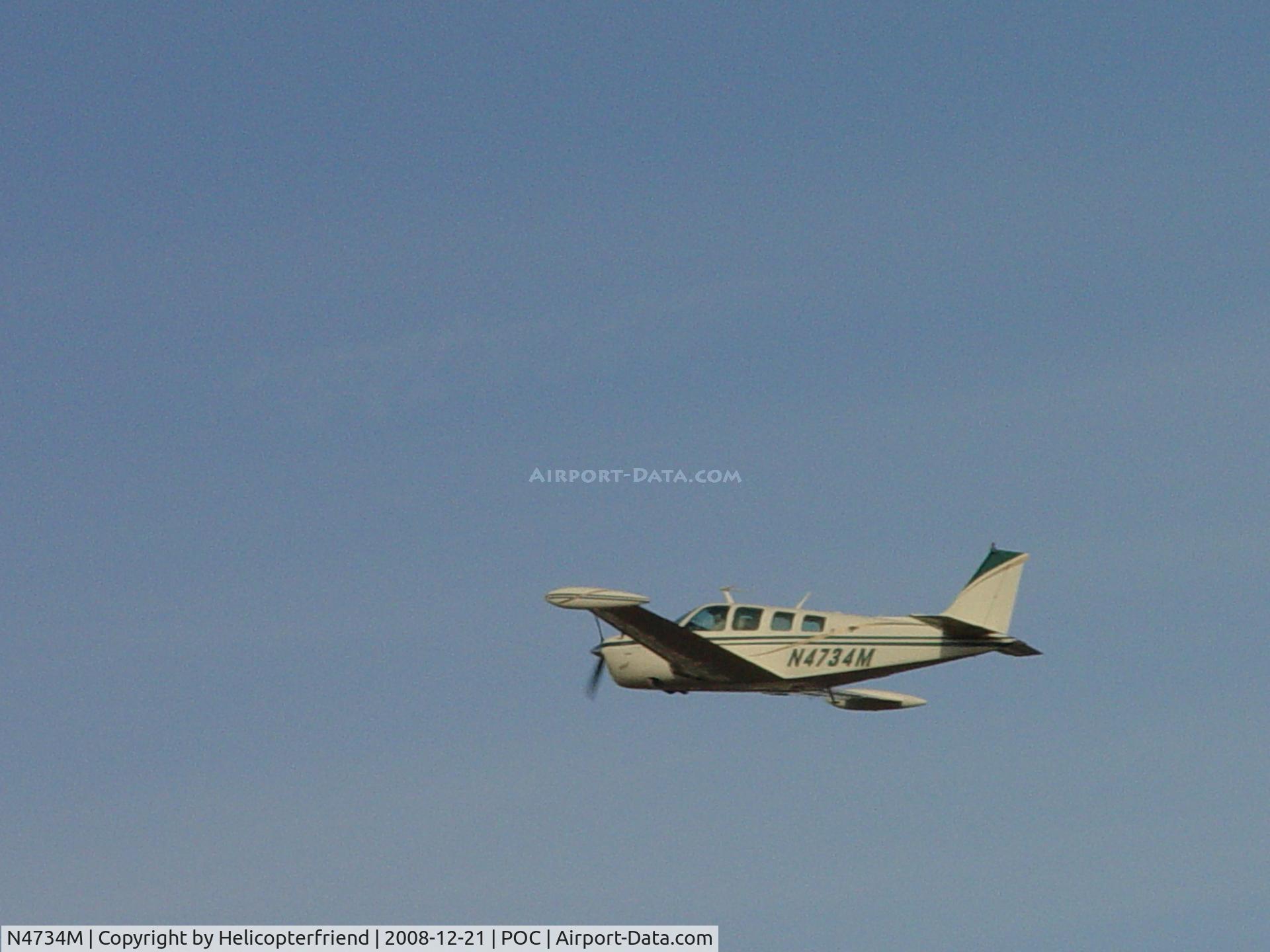 N4734M, 1978 Beech A36 Bonanza 36 C/N E-1257, Climbing out westbound