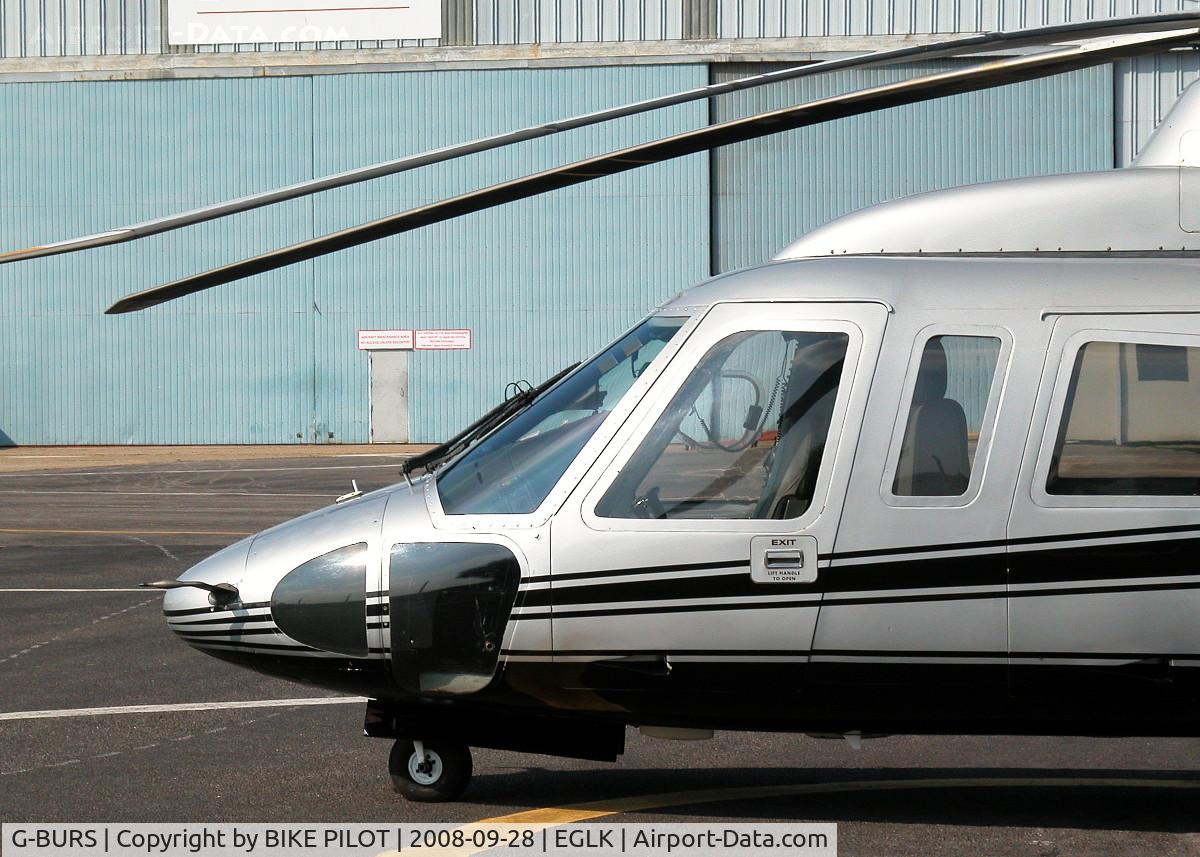 G-BURS, 1980 Sikorsky S-76A C/N 760040, SUN BATHING IN THE PREMIAR COMPOUND
